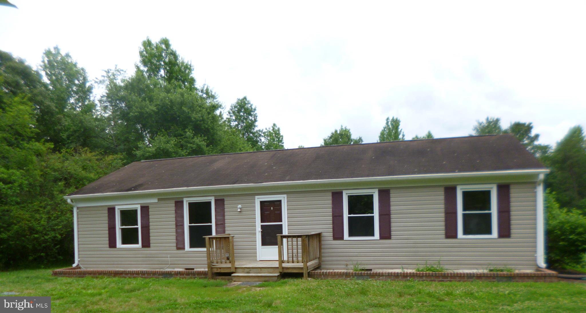 Pastoral setting on 2 acres minutes from Spotsylvania Courthouse and Lake Anna Parkway. One level living feature large country kitchen leading to covered deck. Family room is serviced by full bath. No pets, no smoking, no co-signers. $75 non-refundable application fee for anyone aged 18 or over payable to REMAX Supercenter. 2- year proof of income supported by W-2's plus 2- year of good rental and credit history* Minimum credit score of 630. Income 3x monthly rent. NVAR Application accompanied by photo ID is in documents. Septic supports a 3 bedroom only and tenant is not permitted to wash vehicle/vehicles on property due shallow well and causing wear and tear to the well pump. NOTE previous tenant damaged the bathroom off family room and blinds. Work in progress