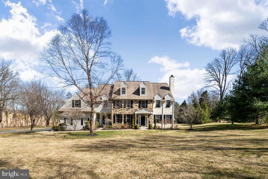 Enjoy the finest quality of living in this magnificent 5 bedroom, 4.5 bath home in highly desirable Lower Merion Twp.  Gorgeous surroundings set on meticulously landscaped grounds, this custom-built home offers spectacular design details with countless upgrades and amenities. Upon entering, you will be impressed by the soaring 2-story reception hall and sweeping staircase. No details were spared in the interior design of this home which boasts new hardwood floors throughout, designer quality wallpaper, high-end chandeliers throughout, wainscoting, crown molding, new hardwood blinds, new carpet in the great room and stair runner and so much more. The first floor offers a flexible flow floor plan from the formal living room with fireplace and attached den, dining room with custom barn door accent, and open kitchen/family room perfect for entertaining and comfortable living space.  The kitchen has been upgraded with new custom cabinets, granite countertops, and a new backsplash which also features a double oven, high-end appliances, and a separate bar area that flows nicely into the heart of the home, the family room, with a converted gas fireplace.  Take the french doors from the kitchen to the back deck and new lower-level large stamped concrete patio.  The lush grounds of the back yard create perfect space for entertaining, private relaxation and there’s even room for a pool!  A newly designed mudroom with benches and hooks and two updated powder rooms round out this floor.  Ascend the gorgeous staircase to the second floor which is dedicated to all the bedrooms – 4 with en-suite baths giving lots of private space and room to have guests.  The expansive main suite is large enough for a separate lounging area and has two custom closets, an en-suite with double vanity, a walk-in shower, and a whirlpool tub.  The third floor has been refinished to use as a 500 sq. ft. office, den, or playroom – a great bonus space for much-needed flexibility to use as needed. Other features of this home are newly painted exterior doors and shutters and an upgraded security system with exterior cameras.  The extensive upgrades and fine details of this home make for gracious and sophisticated living and entertaining.  Wonderful location in Villanova, close to the 476, shopping and great schools.  This is one you won’t want to miss out on.