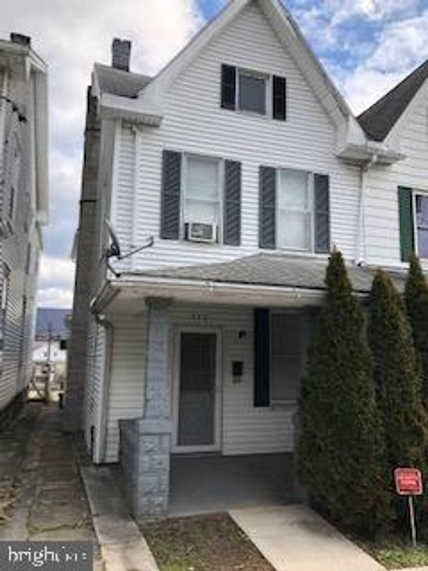 Well kept 1/2 double. Extra large rooms. Detached 1 car garage. 3 seasons rear porch and main floor laundry.