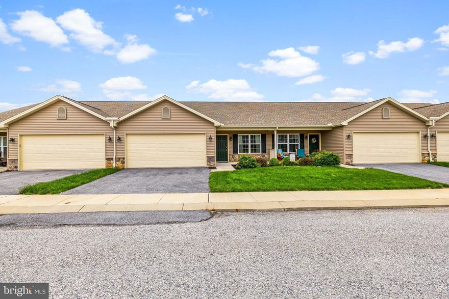 Welcome home to 141 Palomino Way! This beautifully maintained 2-bedroom, 2-bath rancher is nestled in the heart of The Paddock, a sought-after senior living community known for its peaceful setting and neighborly charm. Inside, you'll find a bright, open-concept layout featuring gleaming floors, a spacious living area, and a well-appointed kitchen—perfect for entertaining or relaxing at home. The primary suite offers a private retreat with an en-suite bath and generous closet space, while the second bedroom is ideal for guests or a home office. Step outside to a lovely back patio surrounded by low-maintenance landscaping—perfect for morning coffee or evening breezes. Additional highlights include a new roof (2024), an oversized garage with plenty of storage, and a large unfinished basement offering excellent potential for additional living space or customization to fit your needs. With community amenities just moments away, this move-in-ready gem offers comfort, convenience, and room to grow. **Professional Photos Coming Soon**