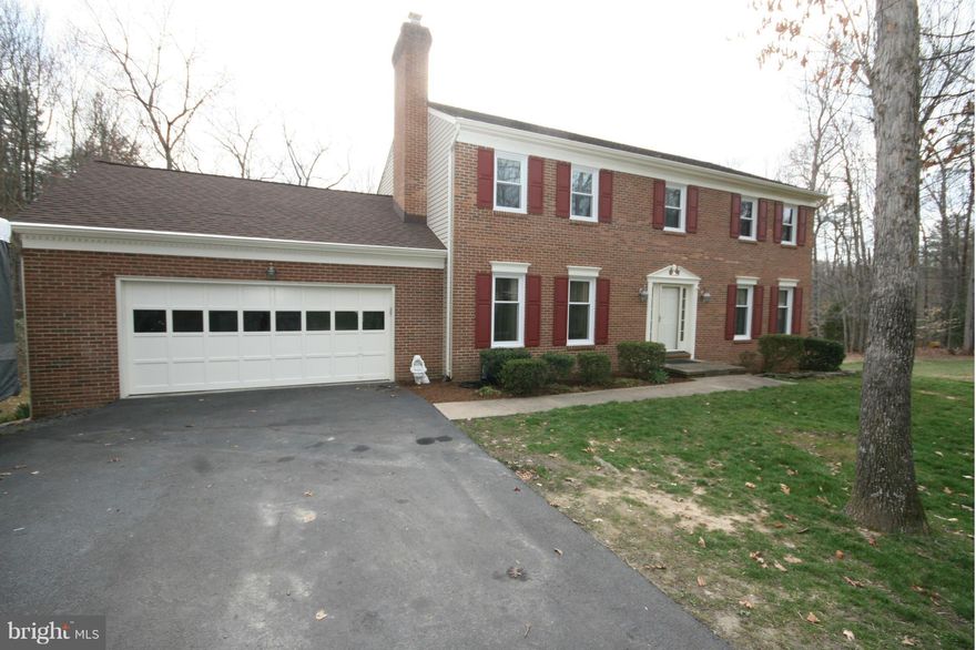 Beautiful well maintained colonial,  This home features an updated kitchen with SS appliances, granite counter tops.Gleaming hardwood floors on every level, two fireplaces, Screen Porch overlooking a large in-ground pool, with diving board, Relax poolside and enjoy the Tiki bar, Large pavilion/carport. Whole House Fan and Generator, New windows, No HOA,  CHARLES J. COLGAN,SR.HS   Move in Ready!