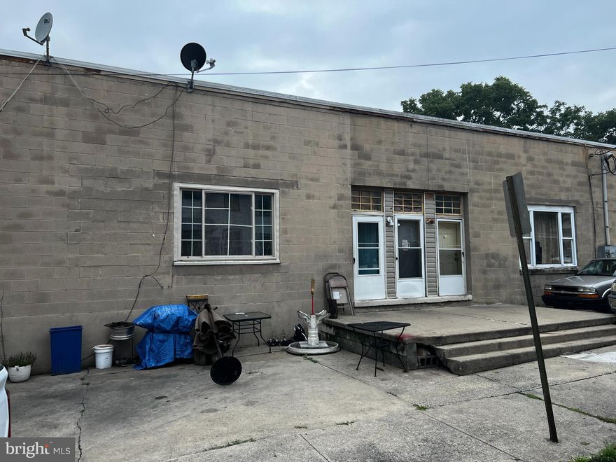 Opportunity , Opportunity !!  This property is a true rare find.  8 rented apartments on the upper floor. and 5000 Sq foot of warehouse / commercial space on the lower floor. This property also has 2 additional lots that convey for additional parking.  Current monthly income is $86400.00 per year