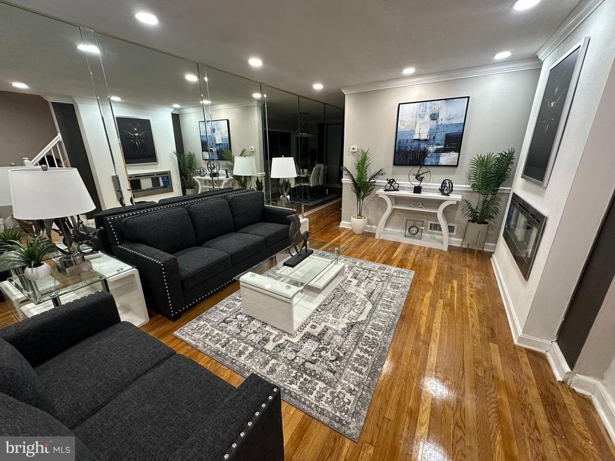 Perfect Package, Perfect Price! This charming traditional townhouse, built in 1955 underwent major renovations in 2025.  It offers a perfect blend of classic elegance and modern comfort. With 3 spacious bedrooms and 2 full bathrooms, this home is designed for both relaxation and entertainment. The open floor plan invites natural light, showcasing beautiful hardwood floors and crown moldings throughout. The heart of the home is the efficient kitchen, featuring upgraded countertops and stainless steel appliances, including an ENERGY STAR refrigerator and self-cleaning gas oven. Enjoy meals in the formal dining area or on the inviting deck, perfect for morning coffee or evening gatherings. The main level also boasts a cozy living space with recessed lighting and a skylight, enhancing the warm ambiance. The fully finished basement with a family room, also provides additional storage and laundry facilities, while the daylight windows create a bright and welcoming atmosphere. Outside, the property is surrounded by a cleared lot that backs onto an open common area, offering serene views of the city and a peaceful retreat from the hustle and bustle. Located in a friendly neighborhood with convenient on-street parking, this home is just steps away from sidewalks and street lights, ensuring a safe and inviting environment. With its thoughtful features and prime location, this townhouse is ready to become your new sanctuary.