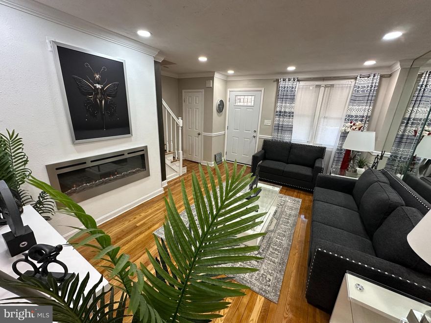 Features New 20 Year Roof, New 20 Year Furnace, each with guarantee. 
This charming traditional townhouse, built in 1955 underwent major renovations in 2025.  It offers a perfect blend of classic elegance and modern comfort. With 3 spacious bedrooms and 2 full bathrooms, this home is designed for both relaxation and entertainment. The open floor plan invites natural light, showcasing beautiful hardwood floors and crown moldings throughout. The heart of the home is the efficient kitchen, featuring upgraded countertops and stainless steel appliances, including an ENERGY STAR refrigerator and self-cleaning gas oven. Enjoy meals in the formal dining area or on the inviting deck, perfect for morning coffee or evening gatherings. The main level also boasts a cozy living space with recessed lighting and a skylight, enhancing the warm ambiance. The fully finished basement with a family room, also provides additional storage and laundry facilities, while the daylight windows create a bright and welcoming atmosphere. Outside, the property is surrounded by a cleared lot that backs onto an open common area, offering serene views of the city and a peaceful retreat from the hustle and bustle. Located in a friendly neighborhood with convenient on-street parking, this home is just steps away from sidewalks and street lights, ensuring a safe and inviting environment. With its thoughtful features and prime location, this townhouse is ready to become your new sanctuary.