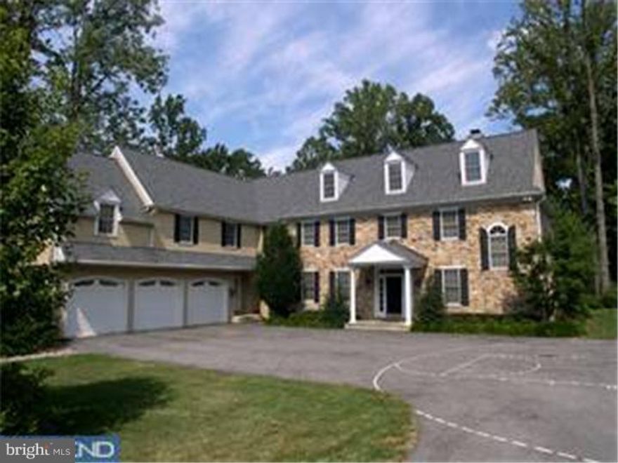 This elegant custom stone home built with the finest of materials, details and craftsmanship has an extraordinary floor plan, extensive millwork and exquisite architectural details.  There are 9+ foot ceilings, beautiful hardwood floors and elegantly designed staircase and very charming fireside Family Room with custom built-ins.  Designed by Scott McIntyre and built by highly respected builder, Ted Baiby, this home is ideally situated on almost an acre in the renowned Tredyffrin-Easttown school district.  Plenty of room to spread out with a finished lower level and a private Den/Office away from the living area with exit to patio.  Master Suite with dressing room, his and her walk-in closets and a Master Bath with whirlpool tub and separate shower.  Four additional Guest Bedrooms, two additional Bathrooms, spacious laundry, computer area and walk-up attic with roughed in plumbing.