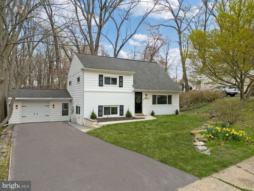 Welcome to 16 Sunset Drive—a beautifully updated 5-bedroom, 2.5-bath home located in the highly desirable Ronnie Creek neighborhood and within the award-winning Great Valley School District of Paoli. With no HOA, low taxes, a flexible layout, and modern upgrades throughout. 

Recently renovated, the home features brand-new flooring, LED recessed lighting, a new HVAC system, a newer roof (2020), and fully updated bathrooms.

At the heart of the home is a custom-designed kitchen showcasing classic Shaker cabinetry, quartz countertops, GE stainless steel appliances, and expanded storage—ideal for both everyday living and entertaining.

The main level offers a bright living and dining area with large windows that fill the space with natural light and provide beautiful views of the neighborhood and backyard. You’ll also find a spacious family room with access to the rear deck, a stylish powder room, and a sun-drenched three-season sunroom with soaring cathedral ceilings—perfect for a play area, home office, or quiet retreat with year-round views of the private yard.

Upstairs, you’ll find four generously sized bedrooms, a beautifully renovated hall bath with TUB and ceramic tiles, and a walk-up attic for additional storage.

The finished lower level adds tremendous versatility with a full bathroom, laundry/utility area, a vaulted den/mudroom with skylights and walk-out access to the patio, and a fifth bedroom—perfect for a primary suite, guest room, or in-law space. The mudroom can be accessed from both the driveway and garage, and the newly installed custom coat cabinet adds a sleek, functional touch.

Step outside to a level, tree-lined backyard that offers privacy, open views, and ample space for entertaining, playtime, or peaceful mornings.

Additional highlights include an oversized one-car garage, parking for 3+ vehicles, and a sidewalk-lined neighborhood filled with mature trees—ideal for evening strolls. All within close proximity to the Paoli Train Station, Main Line amenities, major highways, shopping, dining, Vanguard, and more.