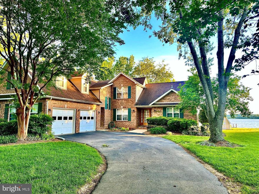 Check out 3D Tour***************************"A home by the river carries the promise of tranquility, where each day begins and ends with beauty."

Discover the serenity of waterfront living in this stunning brick-front home in Wicomico Shores, where the optional HOA grants you freedom to embrace your ideal lifestyle. Spanning 2,725 finished square feet, this residence is designed to immerse you in the beauty of the Wicomico River. Wake each morning in the main-level master bedroom, where expansive windows frame breathtaking river views, inviting the golden hues of sunrise to greet you. As evening falls, unwind on the screened-in porch, savoring gentle breezes and vibrant sunsets that paint the sky from the spacious backyard.

This home is a haven for water enthusiasts, complete with a private pier featuring an 8,000-pound boat lift and two jet ski lifts, offering effortless access to river adventures. The deck and porch provide perfect vantage points to soak in the tranquil surroundings, where the rhythm of the water becomes part of your daily life. Inside, abundant windows flood the space with natural light, ensuring the river’s sparkle is never far from view. With ample space for entertaining or quiet reflection, this home blends practicality with the intangible magic of waterfront living—where every day feels like a retreat.

Located in the vibrant Wicomico Shores community, you’re steps from the renowned Wicomico Shores Golf Course, an 18-hole public gem owned by St. Mary’s County. Designed by Edmund B. Ault and opened in 1962, this par-72 course stretches 6,397 yards from the back tees, with a course rating of 70.0 and a slope of 121. Its generously sized greens, level fairways, and diverse hole designs challenge golfers of all skill levels while offering scenic views of the Wicomico River and surrounding wildlife. Beyond golf, the community boasts a public boat ramp and a 150-foot fishing pier, enhancing the outdoor lifestyle that defines this area.

Living here means embracing a lifestyle where the water shapes your days—mornings filled with the soft lapping of waves, afternoons of boating or fishing, and evenings under starlit skies, all from the comfort of your own slice of paradise. This is more than a home; it’s a way of life, where the river’s timeless beauty becomes your constant companion.  Upgrades:  2021 New HVAC System installed 2.0 Ton Train Heat Pump, wifi programmable (upstairs), 2014 Downstairs HVAC unit, 2017 Roof replaced - Timberline Architectural Shingles, 2019 Hot Water Heater Replaced (50 Gallon), 12 Circuit generator 1100 watts, Shed is 12/20 with electric,