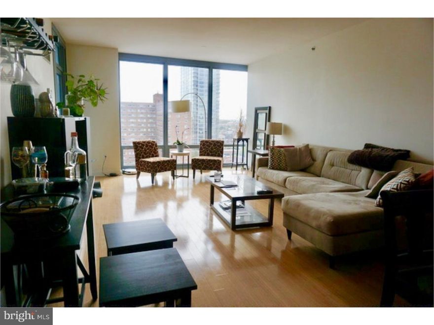 This beautiful 1 bedroom, 1 bathroom condo in The Murano skyscraper offers Center City living at its finest.  This Rittenhouse Square condo is walking distance from the best attractions, shopping, and dining in Center City Philadelphia.  This luxurious condo has an open floor plan and the finest interior finishes, such as hardwood flooring, an upgraded kitchen with granite countertops, and stainless steel appliances.  This condo has a beautiful upgraded bathroom as well.  To top it all off, there is a private balcony with stunning views of the city, and floor to ceiling windows to enjoy more views and natural lighting.  ****ON SITE GARAGE PARKING INCLUDED!!!!  The Murano is one of the best buildings to live in.  When it comes to amenities, there are plenty.  Enjoy the indoor swimming pools, fitness center, 24 hour concierge and doorman service,  and much more.  This condo is also in the best location for commuting purposes.  The 30th Street Station is just a few blocks away!