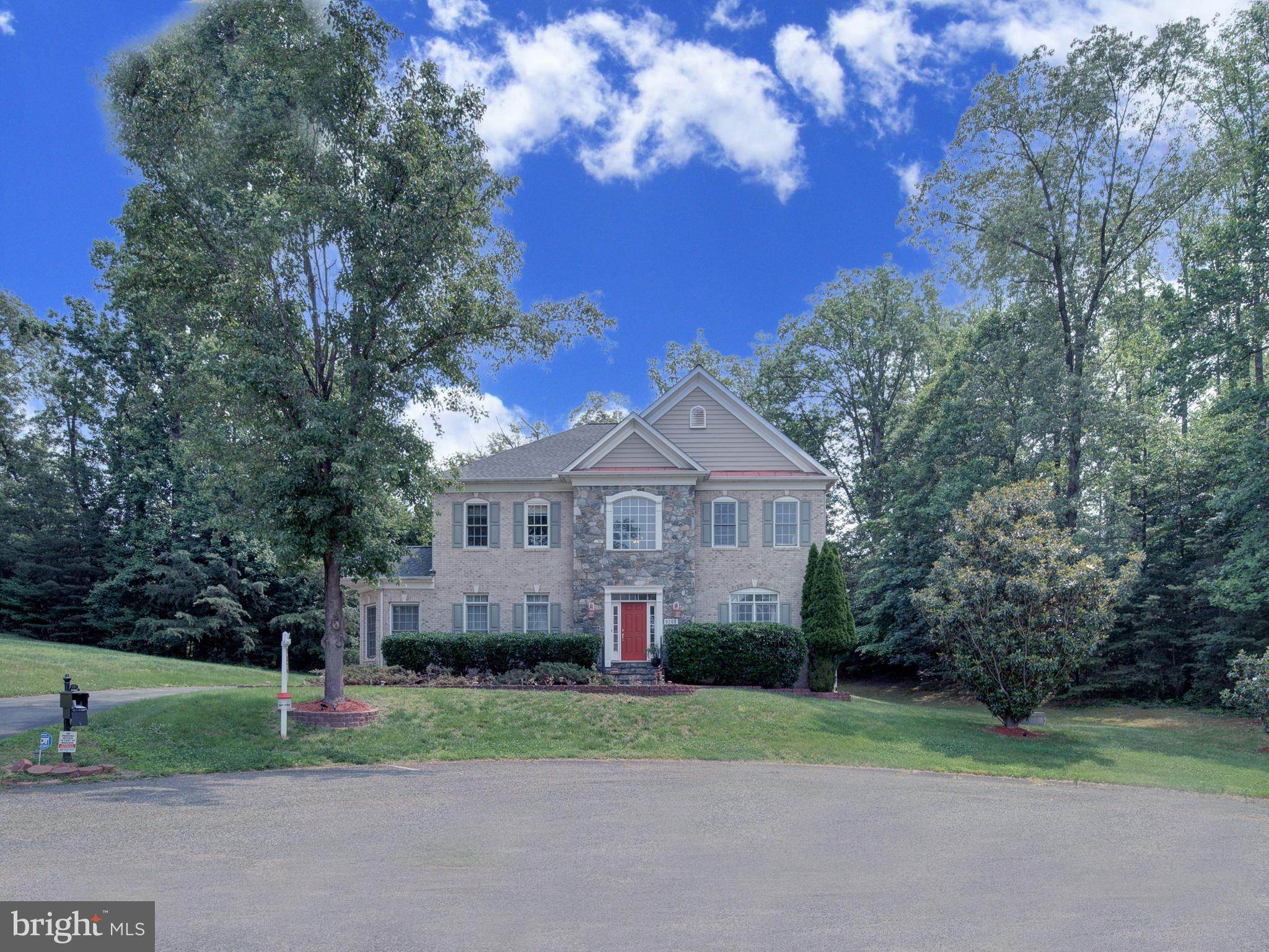 Luxury, Privacy, and Convenience—All in One Stunning Package
Welcome to a former Model Home, 9205 Forest Greens Drive, a spectacular Colonial masterpiece tucked away on a quiet cul-de-sac in the sought-after Marovelli Forest community of Lorton, Virginia. Set back on nearly an acre of beautifully landscaped, tree-lined grounds, this home is a rare blend of serene seclusion and everyday convenience.
As you approach, the long, private driveway draws you in toward a timeless Colonial facade surrounded by lush greenery. Step inside the grand two-story foyer, where you’ll immediately sense the elegance and craftsmanship that define this home. The home sports a richly detailed home office with custom crown molding offers a professional yet comfortable workspace. Entertain effortlessly in the spacious living room or step out onto the expansive deck overlooking your wooded backyard retreat—perfect for morning coffee or sunset gatherings.
All this, just minutes from commuter routes, shopping, dining, and top-rated schools. 9205 Forest Greens Drive isn’t just a home—it’s a lifestyle. Don’t miss your chance to experience luxury, privacy, and location in one extraordinary property.
Schedule your private showing today—before someone else does.
Former Executive Model Home. 5 bedroom / 7 bathroom single family home. 7,292 living area square feet. At end of cul-de-sac, lots of privacy. Schools are some of the best in Virginia.
HOA only $50 per month. Dual staircase. Main floor has solid oak flooring. Details are amazing as former Model Home has extensive ceiling moulding and wainscoating on walls. Garage is side loading and very large at 21 feet x 20 feet. Primary Bedroom has large Sitting Room and a orivate covered deck (15 ft x 14 ft).
Lots of recent home improvements total over $106K.
1). New roof, 2 years ago, and this is large home. $32,240
2). New both HVAC systems, 3 years ago. $17,100
3). Septic system upgraded and distribution box replaced, 4 years ago. $21,400
4). Basement windows replaced last year. $5,150
5) Basement repainted last year, $4,600
and more.