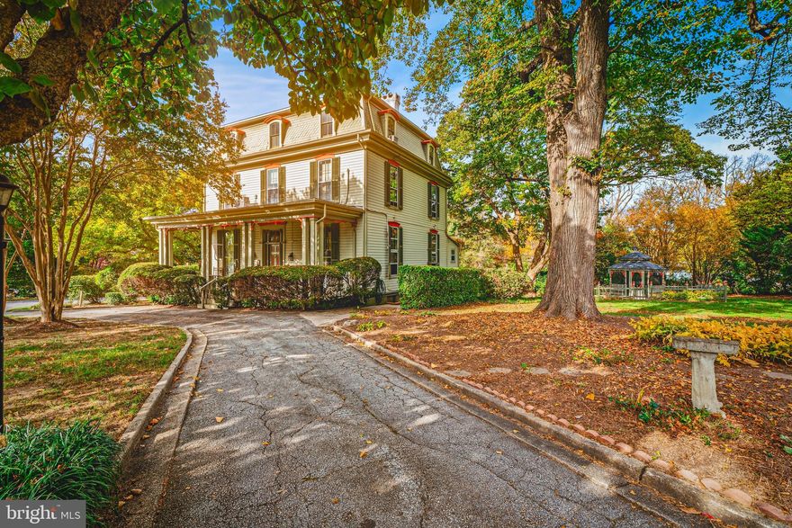 Step into a rare piece of history with this magnificent estate nestled in the heart of Historic Old Lutherville. Originally built in the mid-19th century, this remarkable residence named “Twin Gates” has been lovingly preserved and thoughtfully updated, offering a rare opportunity to own one of the area’s architectural treasures. 
Built with timeless craftsmanship and enduring character, this grand residence offers eight bedrooms and six full bathrooms, providing both elegance and functionality for today’s living. From the moment you arrive, the home’s stately presence and architectural detail transport you to another era, while thoughtful updates ensure comfort and convenience. Expansive rooms, high ceilings, and intricate moldings showcase the artistry of its time, while the generous floor plan offers endless possibilities for multi-generational living, entertaining, or private retreats.  
Beyond the walls, the grounds reflect the home’s grandeur, creating a tranquil setting with space to gather, garden, or simply enjoy the peaceful surroundings. This is more than a home—it is a landmark, a story, and an opportunity to become part of Historic Old Lutherville’s cherished heritage.