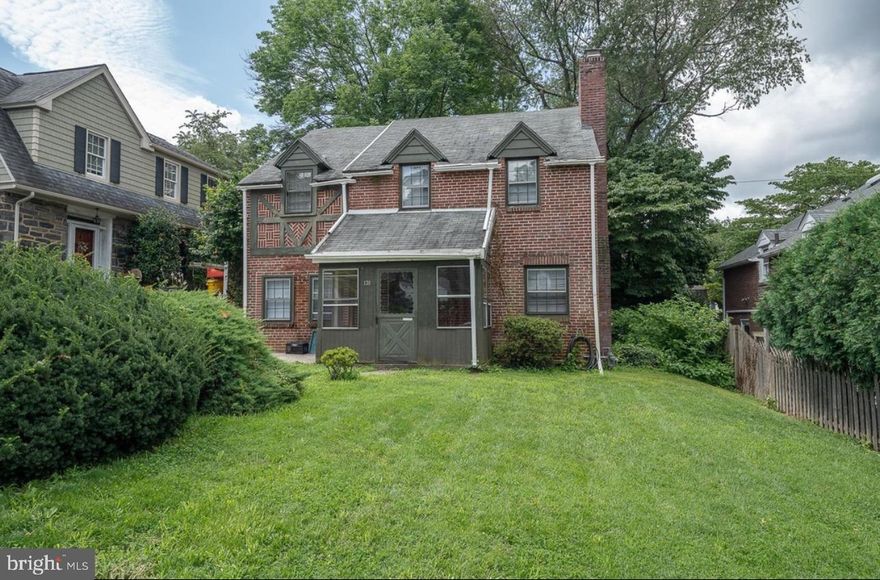 Welcome to 130 Crosshill Road! This 4-bedroom, 1-and-a-half bath in the sought-after Carroll Park section of Wynnewood is waiting to tell its next story.
An enclosed front porch welcomes you into the spacious living room featuring a wood-burning fireplace and hardwood floors that flow into the formal dining room with chair rail moldings and a bay window creating the perfect setting for your next dinner party. The kitchen sits conveniently off the dining room and offers ample counter space and cabinet space and access to the level backyard and rear patio. A family room with a walk-in storage closet and a new half bath complete this level Upstairs you will find the primary bedroom with 2 closets, three additional bedrooms, and a new full hall bath. The finished lower level with ceramic floors is full of options, a playroom, office, or workout space, and is home to the laundry room as well. A large walk-up attic offers tons of storage space.
Located in the award-winning Lower Merion School District. Walk to local parks and the library. Quick commute to major roadways and Center City.
