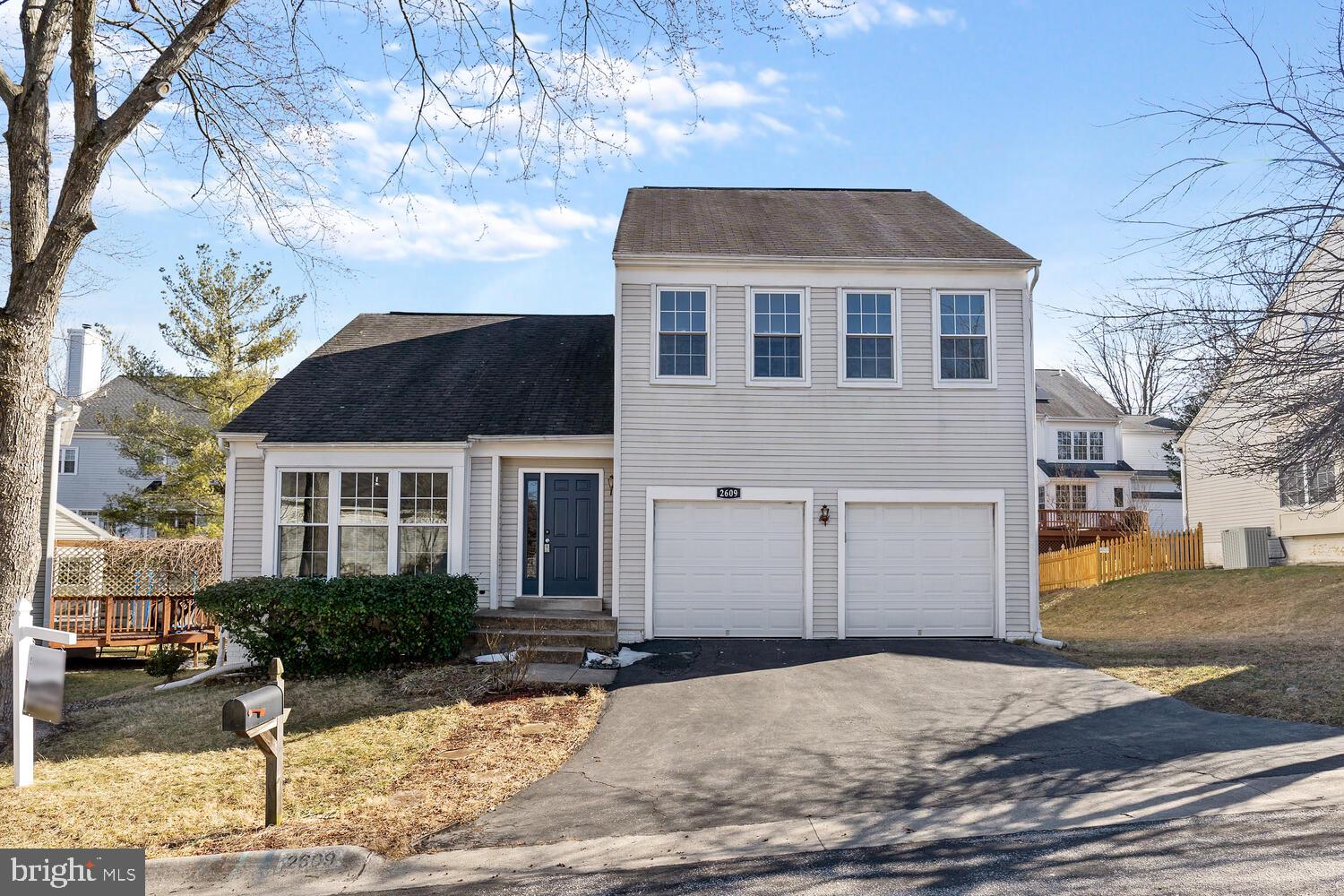 Welcome Home!! Don't miss this sun-filled colonial in the desired Deer Park community. Open the door to see a sunken living room with new laminate floors and vaulted ceilings. The eat-in kitchen features a breakfast bar and remote controlled skylights. This leads to a cozy family room with a brick fireplace that goes out to the custom-built deck. The upstairs features four large bedrooms, including a primary bedroom with a beautifully updated en-suite and vaulted ceilings. The amazing basement allows for endless possibilities featuring a library nook and a seperate rec room that could be a potential 5th bedroom with a full bathroom! The sellers have also installed a new water heater and brand new samsung washer and dryer making this beautiful home move-in ready!