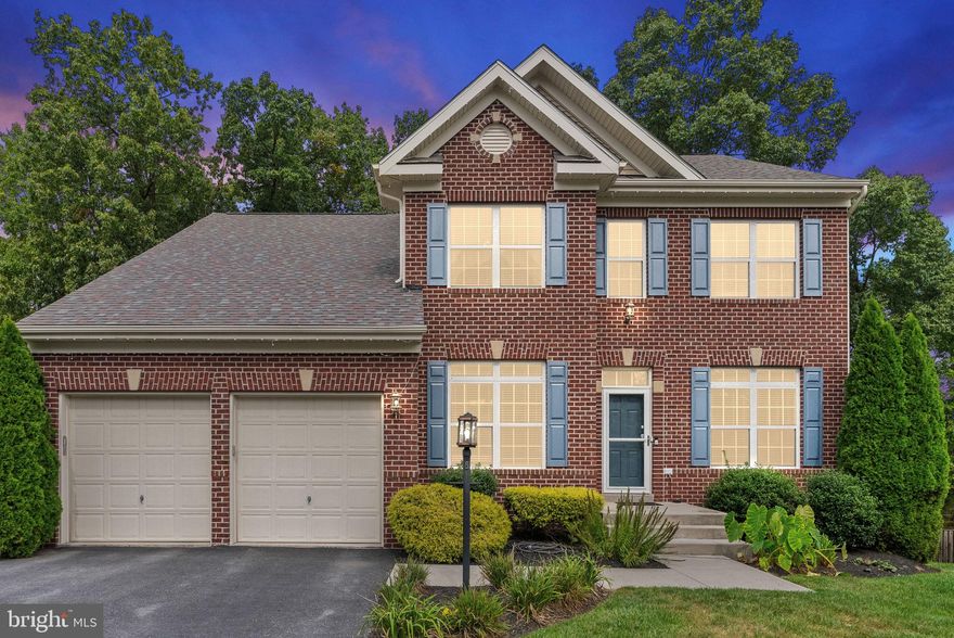 Welcome to 105 Lackawanna Lane, a stunning 5-bedroom, 3.5-bath home offering more than 4,700 finished square feet in the desirable Brookfield on the Potomac community of Falling Waters. Designed for both comfort and functionality, this residence combines generous living spaces with modern amenities and a peaceful neighborhood setting.

The main level features a welcoming foyer where arched doorways lead into the dining room, living room, and kitchen, creating a graceful flow between spaces. The kitchen offers ample cabinetry, a center island, and a breakfast nook overlooking the backyard, while the adjoining family room provides a bright and open space for relaxing or entertaining, anchored by large windows that fill the home with natural light. Just off the kitchen, a large rear deck provides the perfect spot for outdoor dining and gatherings, while a lower-level patio offers additional space for enjoying the outdoors.

Upstairs, the spacious primary suite serves as a true retreat with a large walk-in closet, a full en-suite bath featuring dual vanities, a soaking tub, and a separate shower, plus an attached sitting room perfect for a home office, reading nook, or private lounge space. Three additional bedrooms share a well-appointed hall bath, while the convenient bedroom-level laundry room adds everyday ease.

The finished lower level extends the home’s living space with a large rec room, a full bath, and walk-up access to the backyard—ideal for casual entertaining, a home gym, or overnight guests.

Brookfield on the Potomac offers private river access for kayaking, fishing, and boating, along with scenic walking trails, picnic areas, and playgrounds, creating a lifestyle centered on outdoor recreation and community connection.

Ideally located just minutes from Martinsburg and Hagerstown, residents enjoy easy access to shopping, dining, and parks, with commuter routes including I-81, Route 11, and the MARC train all nearby for convenient travel throughout the region.

With its generous square footage, architectural details, and amenity-rich community, 105 Lackawanna Lane is ready to welcome you home.