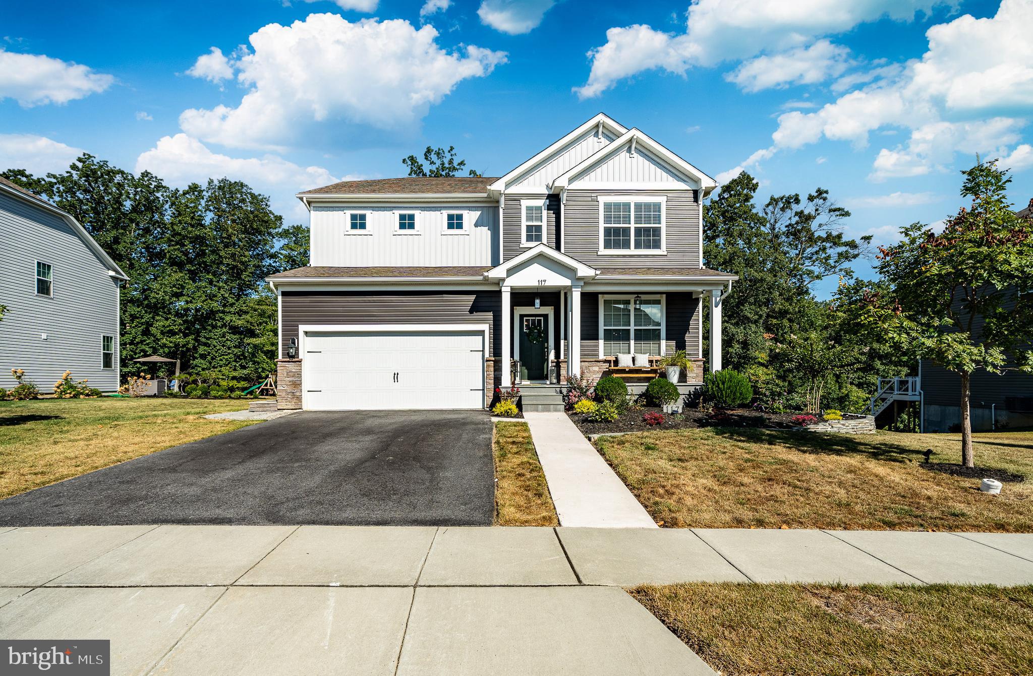 Welcome to 117 Nichols Mill Road, a Home Designed for Comfort, Style, and Versatility
Step into this beautifully maintained, 4 years young residence where every detail has been thoughtfully crafted. With extensive custom upgrades and a spacious, flexible “Hampshire” floor plan, this home is ideal for today’s modern lifestyle—perfect for multi-generational living, entertaining, or simply enjoying life in comfort.
As you enter, you are greeted by an open and inviting layout, filled with natural light and accented by elegant finishes. The gourmet kitchen, a true centerpiece of the home, features high-end cabinetry, quartz countertops, stainless steel appliances, and a large island—perfect for preparing traditional meals or hosting family gatherings. Access to the 16’ x 24’ deck just adds to the entertainment possibilities of this home.
The expansive living and dining spaces flow seamlessly, offering plenty of room for celebrations, festivals, and everyday living. A private first-floor office or flex room provides the versatility to accommodate guests, work from home, or mediation/yoga space. A full bathroom also adds to the versatility of this room.
Upstairs, you’ll find generously sized bedrooms, including a luxurious owner’s suite with a spa-like bath, nicely sized sitting room and expansive walk-in closet. Secondary bedrooms are spacious and thoughtfully designed to offer comfort for every member of the household. The surprise and delight is the enormous open area that could be a wonderful second gathering space, and with a little help from a contractor, an additional bedroom down the road. The laundry room has access from both the owner’s suite and the open area.
The finished lower level adds even more possibilities—whether as a media room, play space, home gym, or second living area for extended family. Plumbing exists for an additional bathroom.
Outdoors, enjoy a quiet setting with a well-kept yard and custom patio, perfect for relaxation and entertaining. Located in the sought-after Downingtown area, this home offers excellent schools, convenient access to major routes, and a welcoming community.
117 Nichols Mill Road is more than just a house, it’s a place where traditions, gatherings, and modern living come together seamlessly.