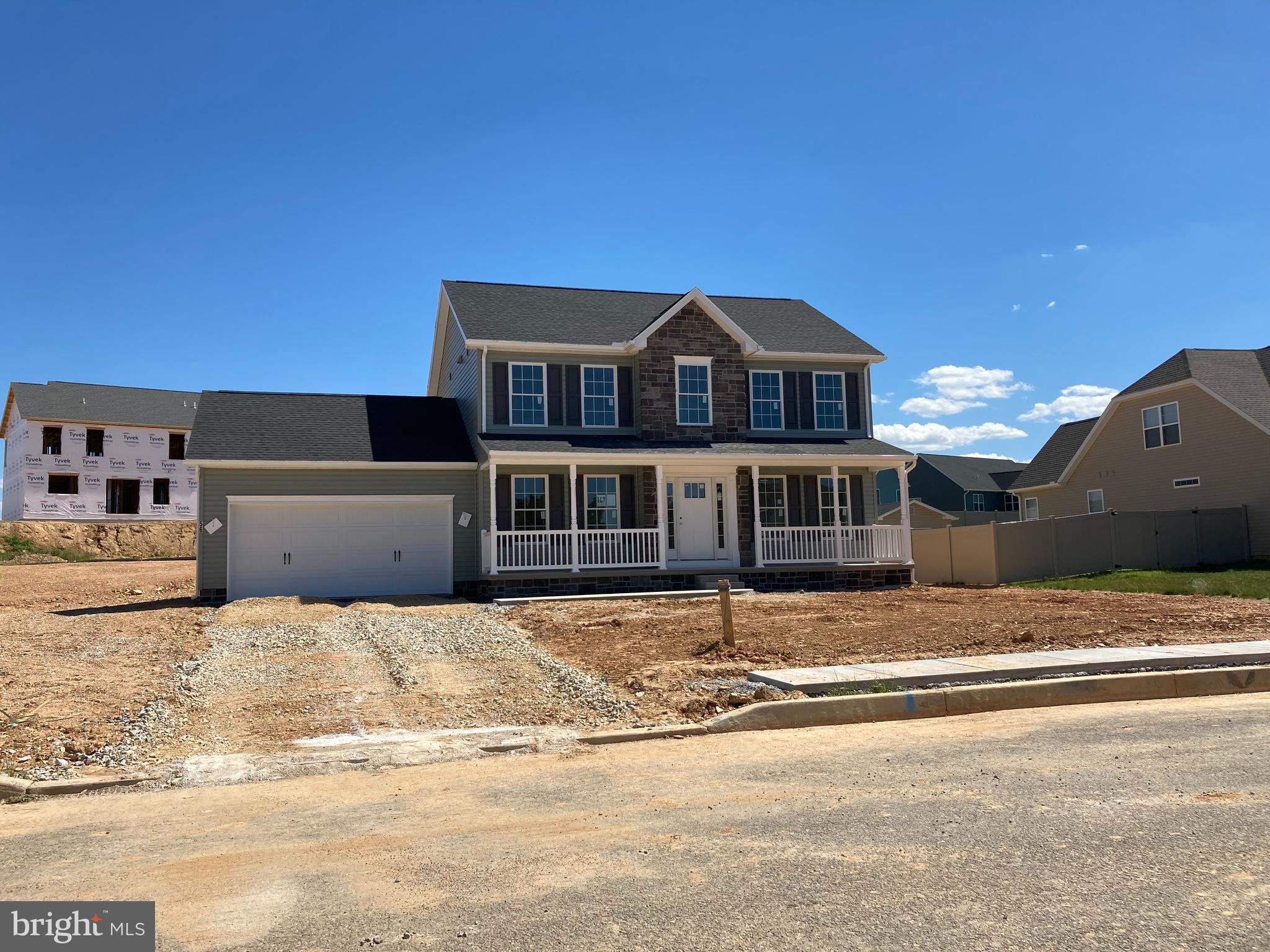 This Abigail features 4 bedrooms, 2 1/2 baths, 2 car garage w/carriage style doors  and remote, full front porch, w/stone at foyer bump, and stone to grade, formal dining room, living room, kitchen with island, pantry, granite countertops, Stainless steel appliances, Gas Fireplace in Family room, Upgraded LVP/Laminate flooring, Owner's bedroom with cathedral ceilings, walk in closet, double sinks, shower, 2 pc. rough in basement, and much more.