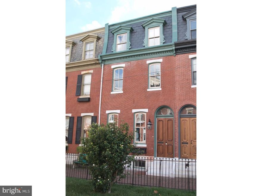 CUSTOM DESIGNER HOME w PARKING! Elegant Restoration & Renovation.  Uniquely located on the 'Garden Block' w 3 bedrooms + 2 open concept Office/Den areas, 2 full-Baths, 2 half-Baths, Full finished basement w storage and rear yard facing Fulton Alley for use as parking or yard. Interior is harmoniously balanced btwn restored details & modern fixtures/amenities. Enter through historically accurate & elegant double doors into Foyer w imported hand-made tiles. Spacious Parlor / Dining area w high ceilings, new glass chandelier, grand windows, wood detail, along w working fireplace & Half Bath. Leads to open concept, Gorgeous, custom, white kitchen w white-gray quartzite counters, Farmhouse sink, grey subway tiles w handmade mosaic tile above stove, pot-filler, GE S/S appliances. 2ND FLOOR:: Entire floor dedicated to Master Suite, walk-through closet, custom Bath, Office space & laundry facilities in hallway. Master Bedroom features a wall of closets, 2 grand windows & walk-thru closet to Master bath w double vanity, quartzite counters, medicine cabinets, walk-in shower, white porcelain penny mosaic tiles t/o. Office is grand w high cielings & custom trim work w direct Master bath access.  3rd FLOOR:: 2 ample sized, light-filled bedrooms & ample closet space. Full Bath between the bedrooms w marble tile, white vanity. Open area to the rear for Den or secondary Office space.  BASEMENT:: full finished basement w high ceilings, ideal for entertaining and media room; half bath. Rear area for storage & mechanicals. OTHER FEATURES::  Dual Zone HVAC, Tankless Hotwater heater, recessed lighting t/o, dimmers for most lighting, intergrated cable lines w flat screen mounting brackets, restored Hardwood t/o & New 5-Panel doors t/o. Incredibly quiet location yet walkable & convenient to PENN, Drexel, Fitler Sq, Schuylkill River Park & Rittenhouse Sq. Walks score of 89, Transit score of 85 & a Bikers Paradise of 99!! Please download floor plans!