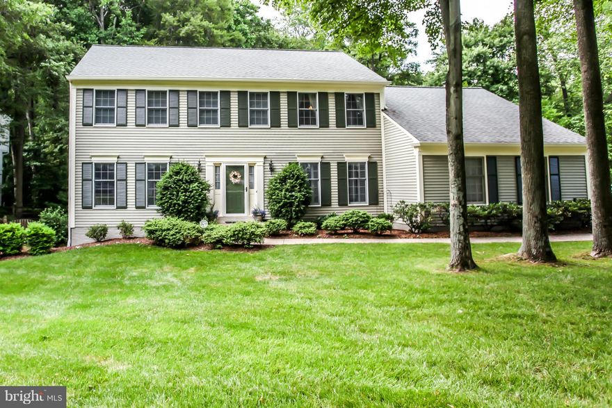 Everything NEW!! custom floors, lighting, cabinets, & paint throughout. Master BR w/ his/her closet, luxury bath w/ ceramic tile & granite. Gourmet Kit w/ center island, SS app, tile backsplash, granite, butlers pantry, wine bar & fridge, ect!!! Family RM w/ builtin cabinets, hardwood floors, & gas FP that walk out to deck overlooking fenced in park like yard. HUGE basement w/ wet bar & 5th BR NTC