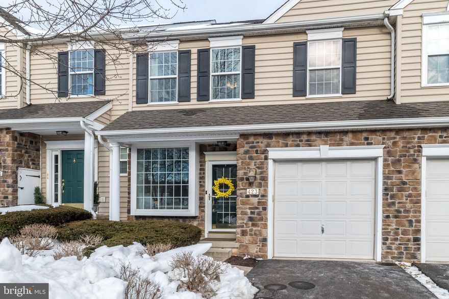 Welcome to this beautiful townhome in the desirable Oxford Lane community, ideally located in Chalfont Borough and within the award-winning Central Bucks School District. Offering the perfect blend of style, comfort, and convenience, this home is designed for both everyday living and effortless entertaining. Step inside to find gleaming hardwood floors flowing throughout the main level. The inviting living room features crown molding and a large front window with a window seat, filling the space with natural light. The living room opens seamlessly into the dining area, creating an ideal layout for gatherings. The heart of the home is the updated kitchen, complete with 42-inch cabinetry, granite countertops, stainless steel appliances, tile flooring, and an oversized island with seating. A spacious breakfast area leads to a composite deck with a privacy wall through sliding glass doors, perfect for morning coffee or dining outdoors. The kitchen overlooks the cozy family room, highlighted by recessed lighting and a gas fireplace for warm, relaxed evenings. Upstairs, you’ll find three generously sized bedrooms and two full bathrooms, along with the convenience of an upper-level laundry room. The primary suite is a true retreat, featuring a tray ceiling, ceiling fan, an enormous walk-in closet, and an ensuite bath with a soaking tub, walk-in shower, and double vanity. The fully finished lower level expands your living space even further, offering a bright walkout basement with abundant natural light, a half bath, and plenty of storage. Additional highlights include a one-car garage and an unbeatable location just minutes from Peace Valley Park, shopping, dining, and the Chalfont train station. Move-in ready and beautifully appointed, this is one you won’t want to miss.