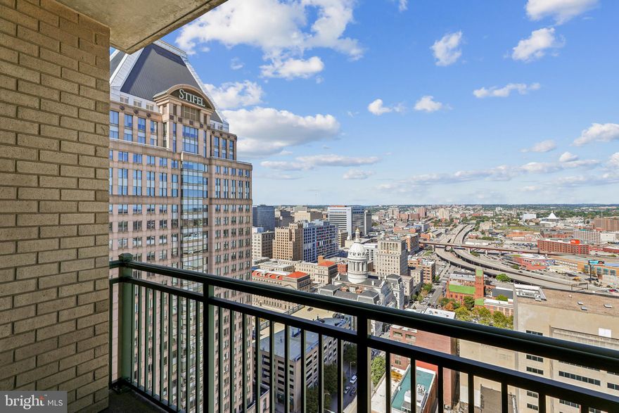 Wake up to breathtaking Baltimore skyline views from the 30th floor in this immaculate condo featuring rare oversized garage parking and resort-style building amenities. This immaculate unit offers wood flooring in the main living area, soft Berber carpet in the bedroom, and an updated kitchen with granite countertops and GE stainless steel appliances. An in-unit washer and dryer adds everyday convenience. Step onto the private balcony to take in sweeping city views with your morning coffee or unwind at the end of the day.
The unit includes a rare oversized reserved garage parking space—approximately 1.5 spaces—large enough for a car and motorcycle. Condo fee includes gas, water, and sewer, and the home features gas heat, cooking, and hot water.
Residents enjoy exceptional amenities including a 24-hour concierge, fitness center, pool, hot tub, business center, and game room. Ideally located just minutes from downtown, restaurants, museums, and Baltimore’s vibrant waterfront. Easy, low-maintenance city living with incredible views.