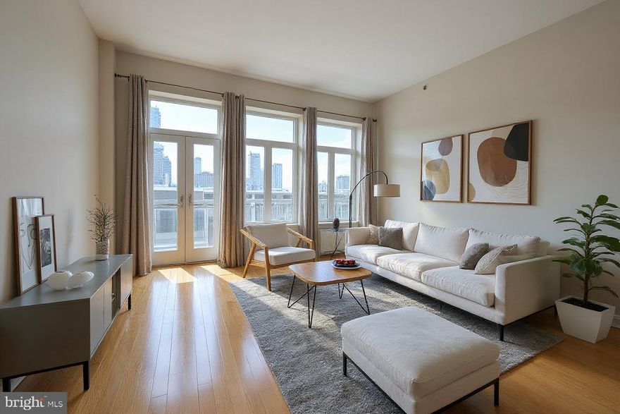 Welcome to this stunning 2-bedroom, 2-bathroom condominium located in the sought-after Tivoli Condominiums, right in the heart of Philadelphia’s vibrant Art Museum area! This exceptional home includes Garage Parking and offers a perfect blend of modern luxury and city convenience. Step inside to a welcoming entryway that opens into a sun-drenched, open-concept living space featuring floor-to-ceiling windows, high ceilings, and gorgeous hardwood floors. Enjoy sweeping skyline views from the expansive private balcony — perfect for relaxing or entertaining. The open kitchen is equipped with granite countertops, stainless steel appliances and impressive cabinetry. The spacious living and dining area offers comfort and flexibility, ideal for both everyday living and hosting guests. 
Retreat to the generously sized primary suite, which features stunning city views, a huge walk-in closet, and a luxuriously renovated bathroom complete with a double vanity and an oversized glass-enclosed shower. The second bedroom is also large and bright, featuring another walk-in closet & an adjacent modern full hallway bathroom with floating vanity. Additional highlights include in-unit washer and dryer, meticulous condition throughout, and one included garage parking space. The Tivoli offers a full suite of amenities, including:  24-hour concierge, state-of-the-art fitness center, a resident community room, and a charging station for electric cars.  Unbeatable location — just steps from world-class cultural attractions like the Philadelphia Museum of Art, Rodin Museum, and Barnes Foundation. Walk to Whole Foods, Target, Kelly Drive, and enjoy quick access to public transportation, Center City, and some of the area’s finest restaurants and cafes. This home truly has it all — comfort, style, convenience and a front-row seat to everything the Art Museum neighborhood has to offer.