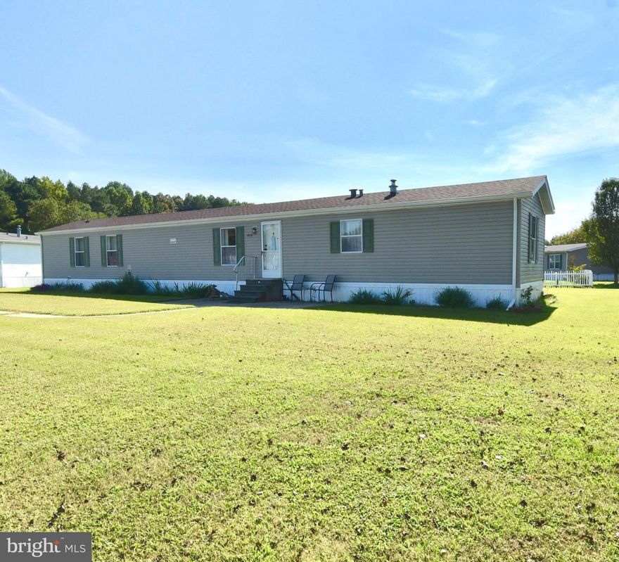 Discover the charm of this nicely maintained 1996 Skyline manufactured home nestled in the desirable Hebron Woods community. This single-wide ranch-style residence offers a perfect blend of comfort and functionality, featuring three spacious bedrooms and two full bathrooms, including a luxurious soaking tub for ultimate relaxation. Step inside to an inviting open floor plan that seamlessly connects the living, dining, and kitchen areas. The eat-in kitchen boasts an island, perfect for casual meals or entertaining guests. Enjoy the convenience of modern appliances, including a gas range, refrigerator, and washer/dryer, all designed to enhance your daily living experience. Natural light floods the space through well-placed windows, complemented by tasteful window treatments. Outside, the property features a concrete driveway with ample parking for two vehicles and an outbuilding for additional storage. The low-maintenance yard allows you to spend more time enjoying the community amenities and nearby attractions. Hebron Woods is not just a place to live; it's a lifestyle. Enjoy the tranquility of the neighborhood while being just minutes away from Ocean City, MD, Rehoboth, DE,  Assateaque and Chincoteaque beaches, the many golf course choices close by, the community catch and release pond, boat launching on the Wicomico or Nanticoke Rivers. Enjoy close by shopping and dining options. This home is perfect for those seeking a peaceful retreat with easy access to everyday conveniences. Don't miss the opportunity to make this delightful home your own-schedule a viewing today and experience the warmth and charm of Hebron Woods!