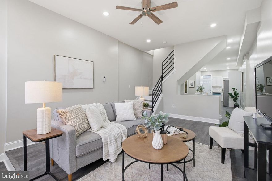 GORGEOUS BRAND NEW RENOVATION NOW AVAILABLE. GLISTENING LVP FLOORING CASCADES THROUGHOUT. ENJOY CUSTOM WHITE CABINETRY, UPGRADED TRIM AND PAINT PACKAGE, IMPORTED TILE, STUNNING QUARTZ COUNTERTOPS, HIGH END FRIGIDAIRE SS APPLIANCE PACKAGE IN DESIGNER CHEF'S KITCHEN. TONS OF NATURAL LIGHT. HIGH CEILINGS. TONS OF STORAGE. WALK-IN SHOWERS. WALK-IN CLOSETS. SPACIOUS 4 BEDROOMS WITH 3.5 BATHROOMS - RARE TO FIND 3 BEDROOMS ABOVE GRADE. REAR FENCED IN YARD - GREAT FOR ENTERTAINING. CLOSE PROXIMITY TO RETAIL SHOPPING, LOCAL DINING, AND ALL MAJOR HIGHWAYS. SCHEDULE A PRIVATE TOUR TODAY.