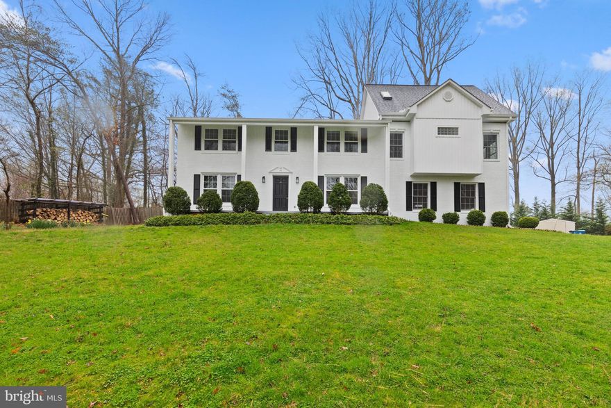 ​Nestled along a serene, tree-lined road in McLean, just outside beltway, stands this impeccably renovated colonial home resting on top of a one-acre lot. The owner spared no expense in refurbishing this residence, which now boasts a new kitchen, new bathrooms, and new flooring, along with an addition to enlarged the primary bedroom suite complete with dual closets and a grand luxury Bath. Additionally, a loft featuring a rooftop deck, enhancing the property's allure.

This remarkable home commands attention as it sits gracefully amidst the lush landscape, offering views of the surrounding area. A newly constructed driveway leads to the spacious garage. Upon entering, one is greeted by a library with Fireplace to the right and the living room to the left, while the dining area lies towards the back, seamlessly connected to the expansive kitchen and open to the rear yard. The kitchen has been thoughtfully expanded with new cabinets stainless steel appliances , providing ample space and storage, complemented by a convenient mudroom.

Ascending the stairs reveals five bedrooms, three bathrooms, and a laundry room, ensuring practicality and comfort for daily living. The loft area, serving as an ideal teen retreat, features a charming fireplace and access to the rooftop deck, perfect for relaxation and entertaining against a picturesque backdrop. This property truly embodies the epitome of refined living in a tranquil yet convenient location. **ALL NEW WINDOWS**