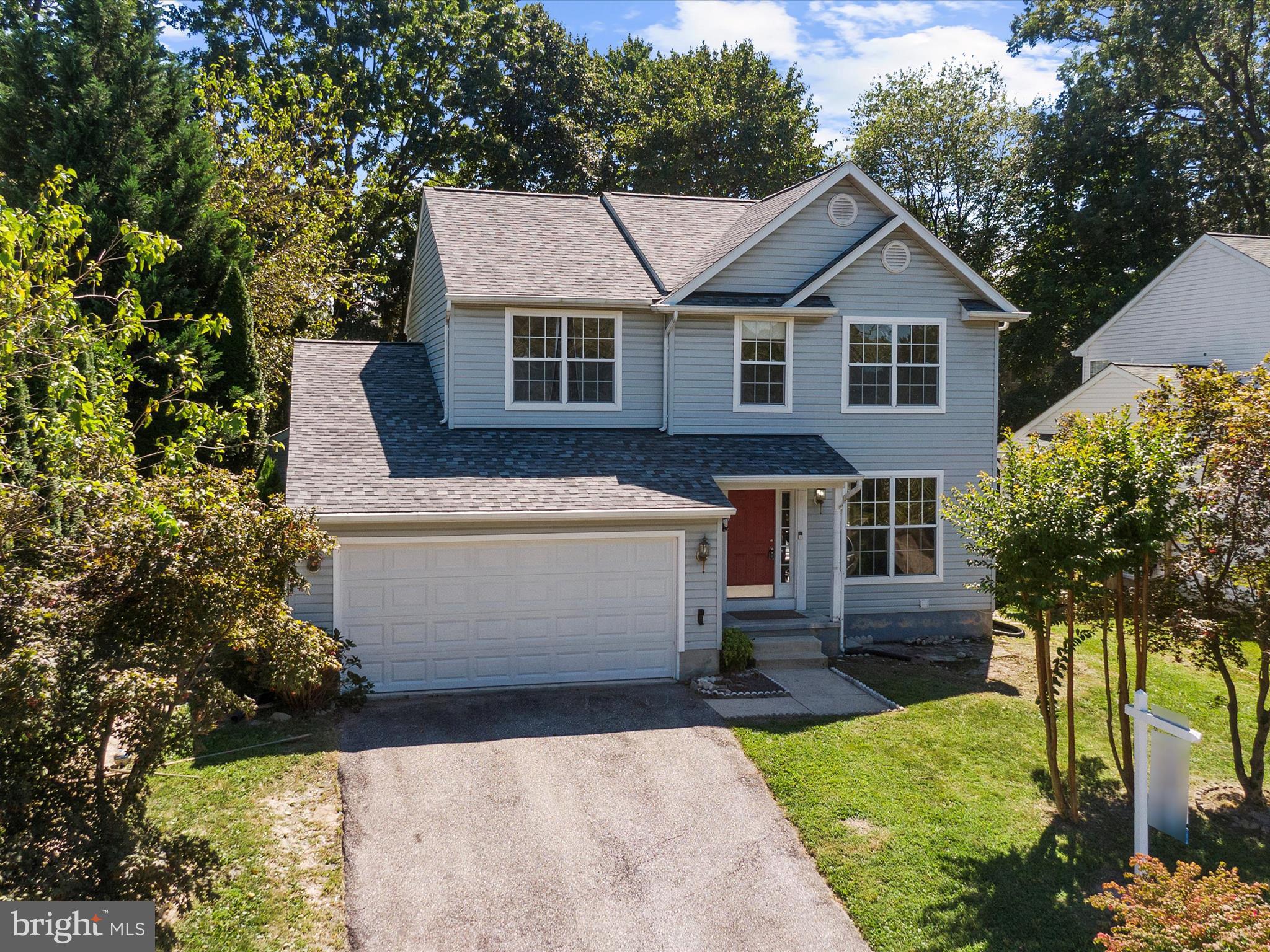Spacious colonial home in the Ashton Woods community of Severn offering versatile living spaces and modern updates. The main level features durable LVP flooring, a bright living and dining area, and a family room with a gas fireplace. The kitchen provides plenty of cabinet space and a breakfast area with access to the deck and fenced backyard. Upstairs, the primary suite includes a private bath and ample closet space, with three additional bedrooms and a full bath completing the level. The fully finished basement is a standout feature, complete with its own full bathroom, kitchenette, and private entrance—making it an ideal setup for a mother-in-law suite, guest quarters, or independent living space. Conveniently located near Fort Meade, major highways, shopping, and dining, this home combines comfort, functionality, and an unbeatable location.