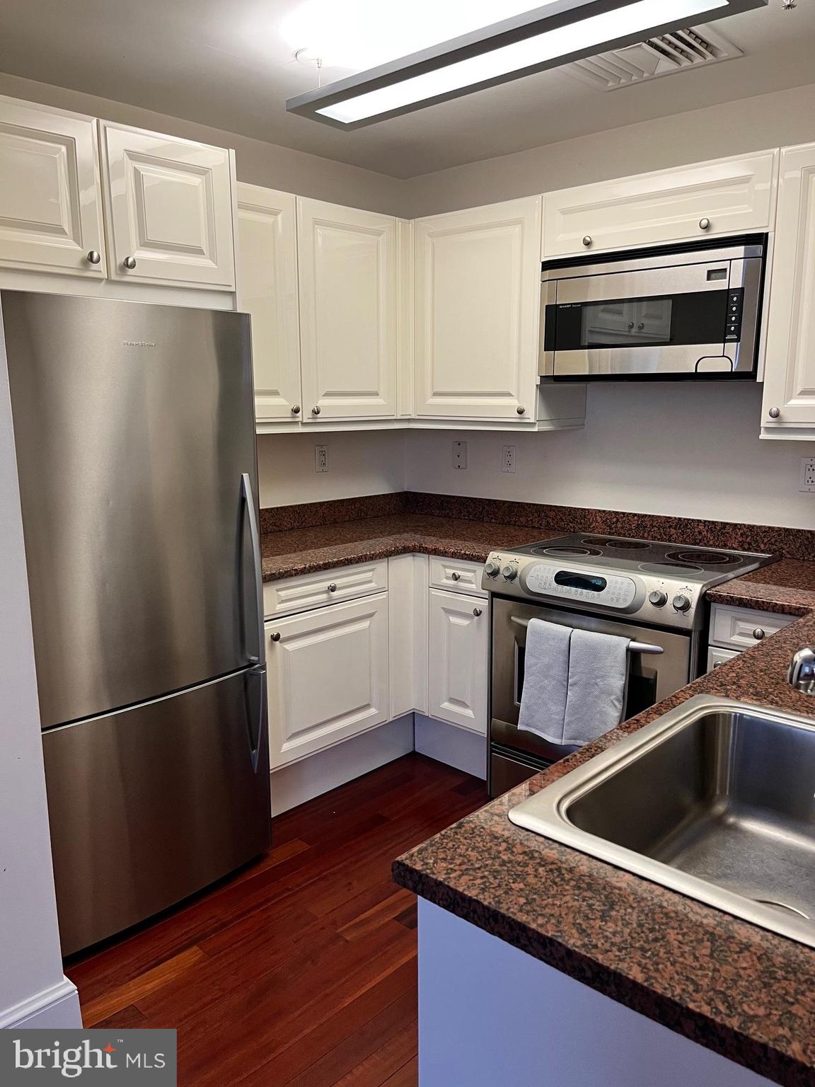 Live the life you’ve always wanted! Gorgeous, move-in ready, 1-bedroom, 1 bath condominium located in The Ellington. High ceilings, large windows to let in lots of light, hardwood floors. Bedroom with walk-in closed and conveniently adjacent, tile bath with elegant fixtures. Gourmet galley kitchen with all stainless steel appliances including refrigerator, microwave and dishwasher. Plenty of cabinets and granite counter tops. Kitchen opens to flexible dining room/living room area which can be utilized in a number of ways...casual dining, office space, living room, etc. And you don’t need to go to another floor or some dark, shared laundry room as this home comes complete with its own stack-able washer/dryer. Large cabinet for TV or cherished photos, awards, etc. completes the look. 24 hour door person. Secure entry into the building with lobby and mail room. Use of the gym and residents' lounge is also included. Outside is the hustle and bustle of the Chestnut Street shopping district—so plenty of conveniences at your door. Minutes from all that center city has to offer including the Avenue of the Arts, a block from SEPTA and PATCO lines to the sports stadiums and so much more!