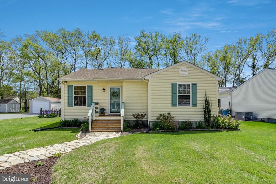 Charming Cottage Just Steps from Award-Winning Downtown Berlin

Welcome to your perfect home base in the heart of one of America's most celebrated small towns! Nestled in a quiet cul-de-sac less than a mile from Main Street in Berlin, MD, this beautifully maintained 3-bedroom, 2-bath cottage offers the rare opportunity to enjoy peaceful neighborhood living just a short distance from everything this social community has to offer.

Recently recognized as one of Main Street America's "Top 10 Great American Main Streets" for 2024, downtown Berlin is brimming with charm, history, and energy. From eclectic shops and local breweries to weekly farmers markets, art strolls, and live music events—you’ll find it all just a short stroll from your front door.

Set on a serene street, this home blends modern comfort with classic small-town appeal. Inside, you’ll find an open-concept living area filled with natural light streaming through the upgraded sliding doors off the kitchen that lead to a large deck—ideal for entertaining or relaxing. The remodeled kitchen is both stylish and functional, and the living and dining spaces flow seamlessly for easy everyday living.

Step outside to your private fenced backyard, which backs to a wide-open field—accessible via your own gate. A charming 16x10 garden shed built in 2020 offers ample storage and includes a 100-amp power panel, making it perfect for hobbies or workshop use.

The interior features thoughtful design choices, including plank flooring in the main living areas, updated lighting, and a remodeled primary bath with a double vanity and oversized step-in shower. Three comfortable bedrooms and a conveniently located laundry closet with full-size washer and dryer make for effortless daily living. Additional storage is available in the floored attic complete with shelving system, easily accessed via pull-down stairs.

With a new HVAC system (2024), no HOA restrictions, and all of Berlin’s best dining, shopping, entertainment, and community events just a short distance away, this home is not just a place to live—it’s a lifestyle.