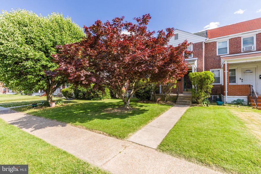 (Professional photos available 5/9) If you’ve been looking for a place that’s actually move-in ready, 6913 Broening Rd is calling your name. This 3-bedroom, 1.5-bath end-of-group townhome has been totally refreshed and is just waiting for someone to move in and make it their own.
The Updates You’ll Love:
Inside, it’s bright, clean, and feels brand new. We’ve freshly painted the whole house in a modern neutral that goes with everything. The original hardwood floors have been professionally refinished and they look incredible—bringing that classic character back to life.
The kitchen and both bathrooms have been updated too. The kitchen has new cabinets, granite countertops, and new appliances. The bathrooms have new toilets and vanities. The basement has new luxury vinyl flooring. 
The Extras:
Being on the end of the row means you get more privacy, more windows for extra sunlight, and a larger fully fenced yard. It’s the perfect spot for a dog, a garden, or just hanging out on the weekend.  The rear porch has a retractable awning for shade when needed. Plus, there is plenty of room in the back if you want to add your own private parking pad later .
