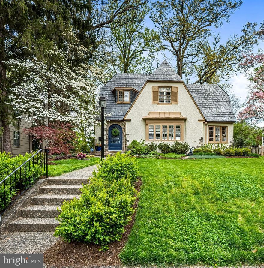 Storybook charm with perfect modern improvements!  You'll be intrigued  from the moment you see the stone-surround arched front  door and will not be disappointed after stepping in to the natural light filled foyer.   A large living room with wood-burning fireplace and built-in cabinetry is the perfect place for quiet relaxation or entertaining family and friends and opens to a sunroom well-suited for an office, exercise or plant room.   The thoughtfully  renovated  kitchen is open to the dining room  and features a stunning herringbone backsplash, pot filler faucet and stainless steel appliances.   French doors from the dining room open to a roomy patio overlooking the amazing large and flat backyard which has a handy parking pad at the back.  The screened porch offers oppotunities for enjoying the outdoors bug free!  The second floor offers 3 bedrooms and a full bath in excellent condition.   Don't miss the most clever closet system you've ever seen in the primary bedroom.! The current owners commissioned professional architectural drawings to add a primary bathroom and additional closet space and are willing to share those with the next owners.   The unfinished basement has been water-proofed and has the ubiquitous Baltimore "flush".   This thoroughly enchanting home is located just minutes from Homeland's Lakes and Belvedere Square .   Whoever purchases this one is lucky indeed!  PHOTOS AND FLOOR PLANS TO BE POSTED 4/14