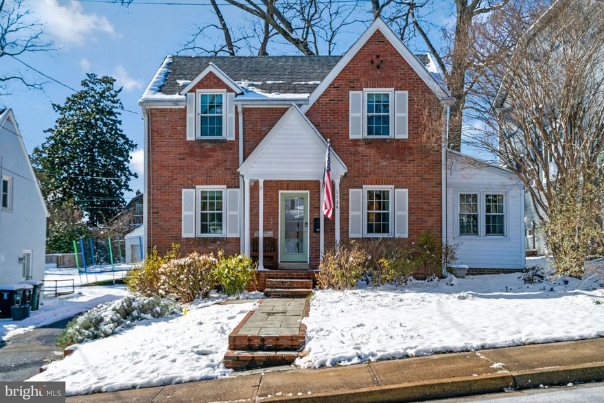 Welcome home to in-demand North Arlington! This gorgeously updated quintessential brick colonial is full of charm and modern amenities. Open the sophisticated art-glass front door and step inside this bright and airy home. Beautiful wood floors lead you into the formal dining room, which features a stunning fireplace flanked by built-in bookshelves. Continue into the home, and you’ll find the light-filled bonus room, an ideal main-floor home office. Inside the completely remodeled kitchen, you’ll discover elegant cabinets, Carrara marble countertops, a farmhouse sink, tasteful tile backsplash, sleek pendant lighting, and an island bar with an impressive mahogany countertop. Adjacent to the kitchen is the spacious and inviting living room, which includes recessed lighting and a fireplace you’ll enjoy all winter long. An attached sunroom is a serene space to enjoy your morning coffee or a good book. Upstairs you’ll find a primary bedroom retreat that boasts hardwood floors, a massive walk-in closet, and recessed lighting. Its en suite bathroom includes a unique vanity and oversized walk-in shower with a built-in seat. Two additional bedrooms both feature large closets and ceiling fans. In the hall, the second bathroom is sizable, with a showpiece vanity and handsome tiling. Downstairs in the lower level, an expansive rec room provides you additional living space. A large storage and laundry room with utility sink can also be found on this level. Outside, the private deck and level backyard are perfect for entertaining or relaxing after a long week. The detached garage offers additional storage, and the long driveway provides you with plenty of parking space for you and your guests. Top-of-the line windows installed 2020. Custom shades throughout the home. This amazing location is truly the best of both worlds! Enjoy city living from your peaceful and palatial single family home. Be just blocks from all that Ballston and Westover have to offer! Minutes to Safeway, Harris Teeter, Target, The Italian Store, Silver Diner, Ballston Quarter, Regal Cinemas, Lacey Woods Park, Lubber Run Park, W&OD Trail, Marymount University, Virginia Hospital Center, Fort Myer, and The Pentagon. Less than two miles to Ballston-MU and Virginia Square-GMU Metro Stations, with quick access to Wilson Boulevard, Langston Boulevard, Washington Boulevard, N George Mason Drive, Rte 66, and Glebe Road. Schedule a private tour of your home today and start the new year out right! *Offer deadline Monday 1/22 @ 2pm*