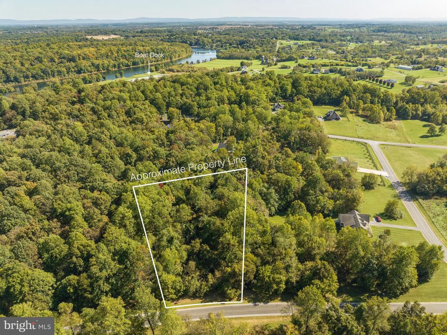 Finally a 2.55 building lot available in the coveted Gated community of Crossings on the Potomac! Wooded lot is located on the Sharpsburg Court Cul-de-sac. Property owners have full access to DEEP WATER Potomac River. Boat Docks and ramp available for property owners. Let Country Roads bring you to Beautiful West Virginia. Close to Interstate 81-Maryland & Virginia. Reach out for more Community Information