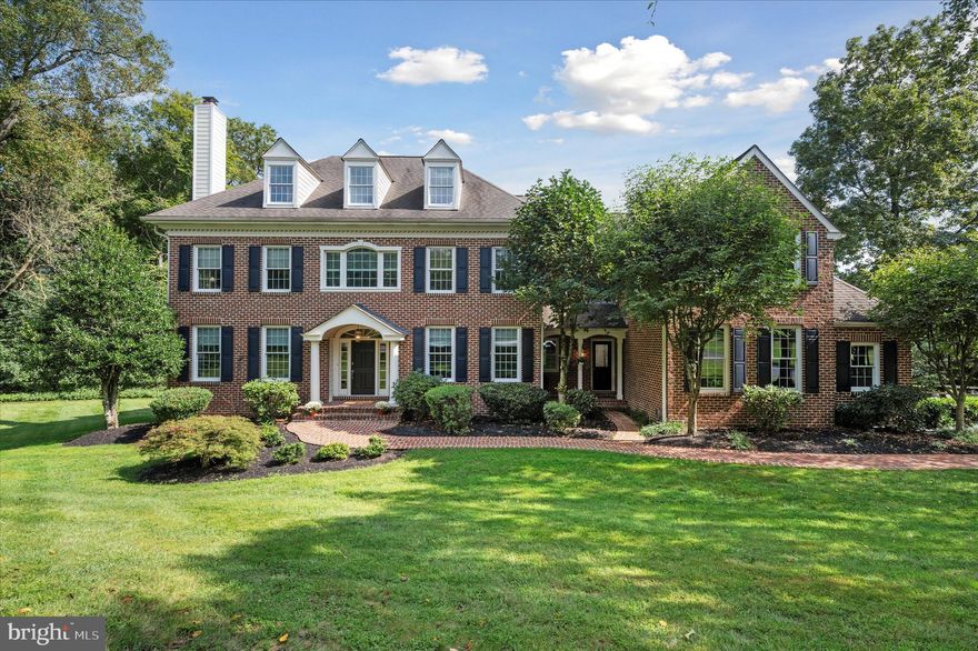 Your dream house awaits you! This beautiful brick, 5 Bedroom, 3 Full and 3 half bath Colonial Manor Home, with finished walk-out lower level, and set against the rolling hills of Historic Edgemont Township, is located in the sought after "Summerhill" Community. Tucked away at the end of a cul-de-sac in the established neighborhood of one acre homesites, this well-appointed home on a premium lot affords  privacy and scenic pastoral views while outside relaxing or entertaining family and friends on the deck.  Leading to both front entrances is a  brick walkway, a recent addition that matches the exterior.  Entering the residence through columned portico, you are  greeted with the natural light of the majestic two story foyer.  Straight ahead is a grand staircase featuring a landing with a Palladian window and custom built window seat. The foyer with custom archways is flanked by the gracious living room w/ fireplace and a spacious dining room that is perfectly sized for hosting family and friends. The  butler's pantry adjoins the dining room and kitchen area.  Continuing on into the fantastic gourmet open concept kitchen and breakfast area is the all granite kitchen featuring an expansive island with prep sink.  Other WOW features include walk in pantry, newer double wall ovens , microwave, Dacor 6 burner gas cooktop with range hood and Sub-Zero 48 inch refrigerator.  With 42 inch Decora Cabinetry, top of the line appliances, and large work areas, this bright and spacious area is a cook's dream .The kitchen opens to the open and airy great room, a warm and inviting space with many windows and a vaulted/cathedral ceiling with two ceiling fans. Highlights include a breathtaking floor to ceiling fieldstone propane gas fireplace with raised hearth and custom built in shelving and cabinetry. Not to be missed is the spacious and artfully designed office, entered through French Doors leading off both the living room and rear foyer. The four full windows with custom wood blinds allow ample light to stream through. Even with a full wall of custom built ins, there remains plenty of space for a large desk, printer table and seating area. Steps away is a conveniently located formal powder room, hall closet, entryway to lower level and a second slider going out to the deck. Completing the first floor is the versatile mud room which can be entered through three car garage or the separate front entrance. Floor to ceiling cubbies and a walk in coat closet offer tons of extra storage. There is a convenient powder room and rear staircase to the second floor. Upstairs,the primary suite provides you with your own private retreat.  It boasts a spacious bedroom with tray ceiling and a separate sitting room, the en-suite bathroom features a double vanity, oversized shower with frameless doors, jetted tub, water closet and a large walk in closet with custom shelving. There are four additional good sized bedrooms each with a walk in closet and two full baths, one en-suite and the other with double vanity and hall and bedroom access. The large second floor laundry room includes a utility tub, folding counter, and utility closet. More storage is provided with the two hall linen closets.  This style home, the "Stanton" the largest model in Summerhill, includes an expansive third floor flex room.  There is a daylight walkout finished basement. Many upgrades throughout including Anderson windows, all hardwood flooring on 1st floor except the living room, detailed millwork and molding,  custom window treatments. Newer updates and improvements: 17kw Honeywell generator (2018) ,a/c plus a/c heat pump(2022) water heater,(2022) TimberTech Deck and Intex Liberty Railing & James Hardie Siding(2023) Enjoy the walking/biking trails and open spaces. Adjacent to Ridley Creek State Park.  Award winning Rose Tree Media Schools! Optimally located between Media & West Chester, convenient to shopping, restaurants and recreation.  Close to major highways and PHL Airport.