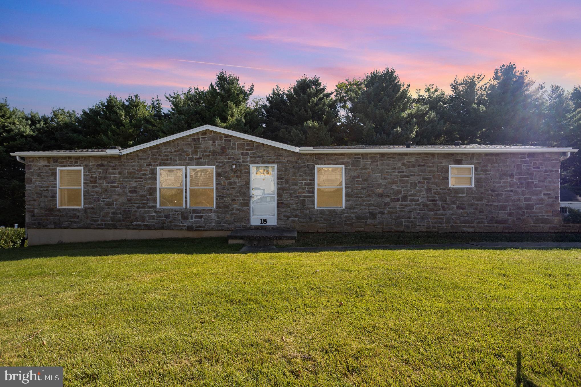 Country living at its finest! This spacious rancher features an open floor plan and a beautifully updated kitchen (2012) with plenty of cabinet space. A brand-new roof was installed in June 2025, providing peace of mind for years to come. The large basement offers endless possibilities and is ready for your finishing touches. Enjoy the private backyard that backs to woods, perfect for relaxation or entertaining on the oversized deck. Best of all—no HOA! Professional photos coming soon!