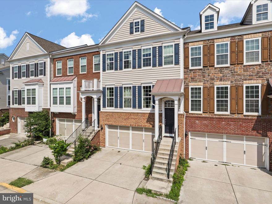 (Available for move-in on June  7th)  Discover this stunning townhome boasting over 2900 sq. ft. of living space spread across three levels. The main level features beautiful hardwood flooring, stainless steel appliances, granite countertops, and a stylish backsplash. The open-concept design and high ceilings create an inviting atmosphere perfect for both relaxation and entertaining. Step out onto the Trex deck that backs to woods, providing a serene outdoor living space.  The primary bedroom is a true oasis with a large walk-in closet, tray ceiling with a fan, and a luxurious oversized bathroom. Additional bonus storage space is available in the garage. Located in East Gate, this home is within walking distance to the commuter lot and offers a wonderful community setting.