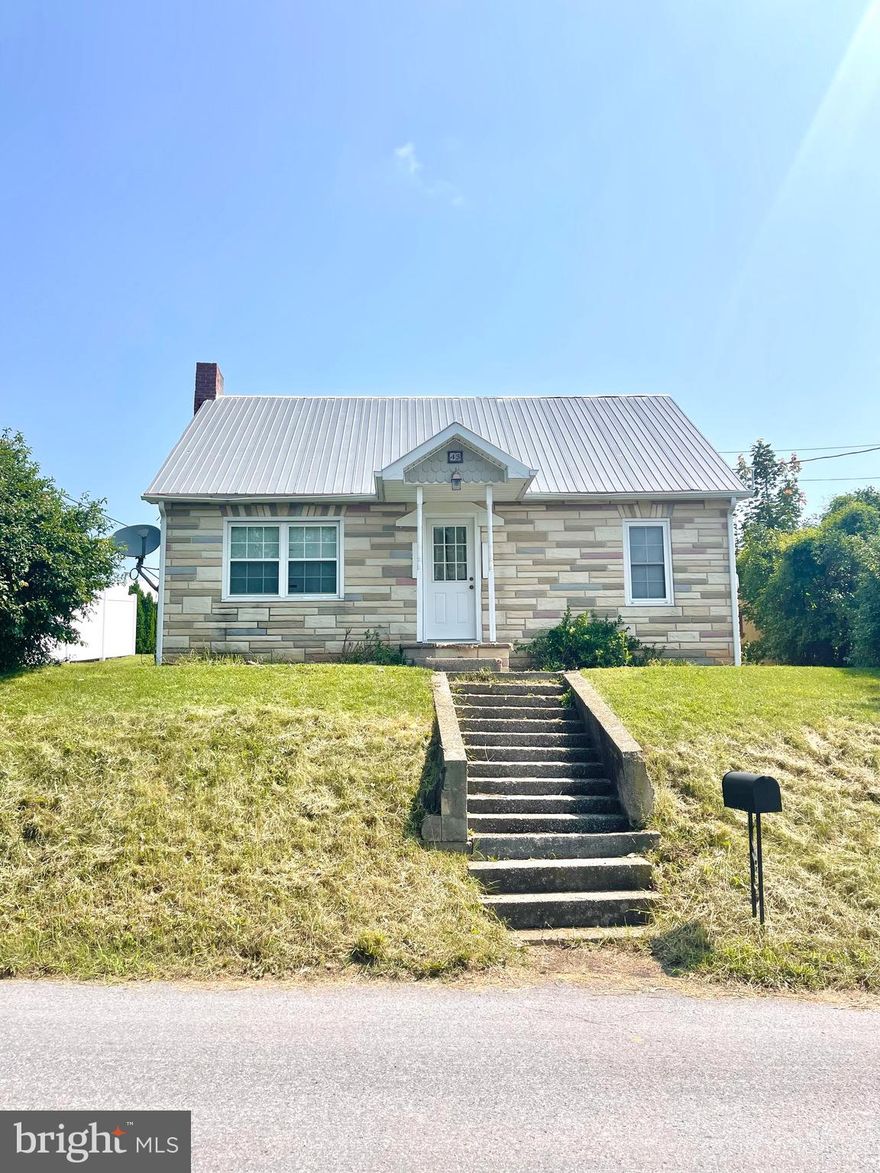 Charming home placed on .27 acres in Belleville. The spacious floor plan offers a generous size kitchen equip with a refrigerator, range, dishwasher and microwave. Mudroom/laundry area that is easily accessible from the rear of the property.  Large dining room with an attached living area and full bathroom. Four bedrooms, one on the main floor with a walk-in closet and three on the second floor. The main bedroom on the second floor has an attached full bathroom, built-in dresser drawers and plenty of closet space. This property offers a one car detached garage and 3 off-street parking spaces. A very large yard, potential garden and cozy patio area. Located on a quiet street and is move-in ready. Get your offers in, very motivated sellers!