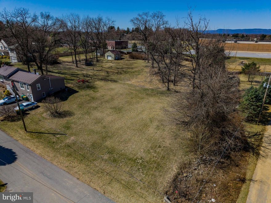 0.54 Acre Lot in Residential neighborhood with Suburban Commercial Zoning.  Situated in the South Middleton School District on the edge of Carlisle, it provides easy access to I81 and tons of shopping. 
Minutes from Target, Michaels, Kohls, Starbucks, The Allenberry, Boiling Springs, The Children's Lake, Downtown Carlisle, Lowes and the list goes on.
The subdivision Plan was approved with the intent for this lot 'to be used for the construction of a two-family detached dwelling' as shown on the plan.  Contact the township to review possible alternates to this plan and what the township will require.
The seller is a custom home builder and would welcome the opportunity to build for you.  Please contact us if you would like to discuss that option.  This is a residential street with no outlet.  Do not visit and walk the property without giving notice (set up as go and show).