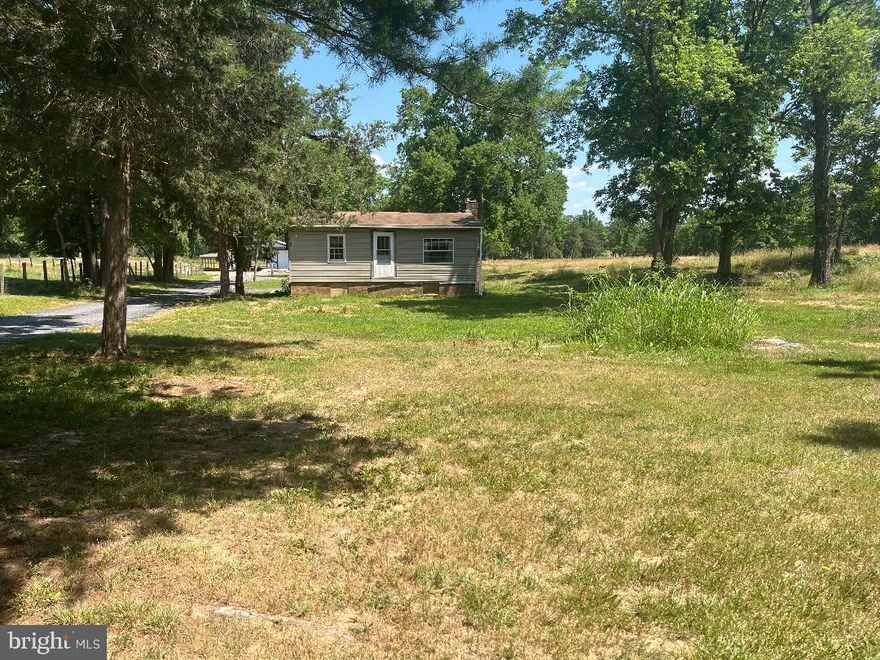 ****BACK ON THE MARKET*****
Charming .69 acre parcel in Kearneysville, WV. Ideal for builders or investors!**
The property is located  just 6 miles from the historic charm of Charles Town on S. Childs Rd, with this serene and peaceful setting that awaits an excellent opportunity for someone to bring thier creativity. This property currently has 869 sq ft that awaits your creativity- rehab or tear it down to build new or make a great tiny house. Property has a well and septic already in place, providing convenience for your developental plans. Also has a 23' x 26' out building with a 10' x 26' lean to and it's own electric meter that makes a perfect work shop. Whether you're looking to execute a fix n flip or start new with a custom build, this property is priced competitively . Don't miss this fantastic investment opportunity in a desirable location. Propertry is being sold as is! One of the owners is a licensed real estate agent.