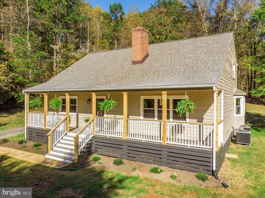 THIS HOME IS A MUST SEE! Unbeatable Privacy OF 10.95 ACRES & MINUTES to the Town of Culpeper.  RENOVATED Inside & Out * CHARMING Covered Front Porch with porch swing * EXCELLENT Layout for Entertaining. STUNNING Kitchen with QUARTZ Counter Tops, Stainless Steel Appliances* Family Room w/ Wood Burning Fireplace * Gorgeous Hardwood Floors*French Doors to deck with more Privacy* First Floor Master Suite w/ Barn Door and breathtaking Master Bathroom * Bedrooms on Upper Level are over-sized (17 X 22) with INCREDIBLE closet Space .AN ABSOLUTE MUST SEE.