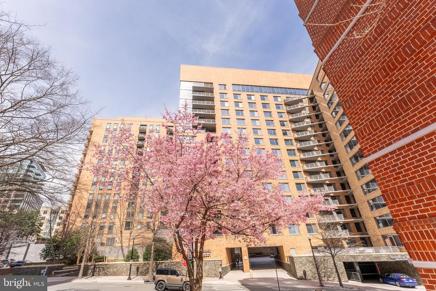 Experience luxury living at The Odyssey in this stylish 1-bedroom, 1-bath condo in the heart of Arlington. This beautifully updated unit features wood-look flooring throughout the open living area and bedroom, a modern kitchen with granite countertops and a breakfast bar for extra seating, and an upgraded bathroom with sleek lighting, a contemporary mirror, and new tile flooring. Step out onto your private balcony overlooking the serene courtyard. Enjoy the convenience of an in-unit washer and dryer and an assigned garage parking space. The Odyssey offers resort-style amenities, including a 24/7 concierge, state-of-the-art fitness center, party room, and a stunning rooftop pool and terrace with panoramic city views. Unbeatable location just moments from the Courthouse Metro, with easy access to Arlington Blvd., Richmond Highway, and I-66. Surrounded by endless dining, shopping, and entertainment options—don’t miss this exceptional opportunity!
