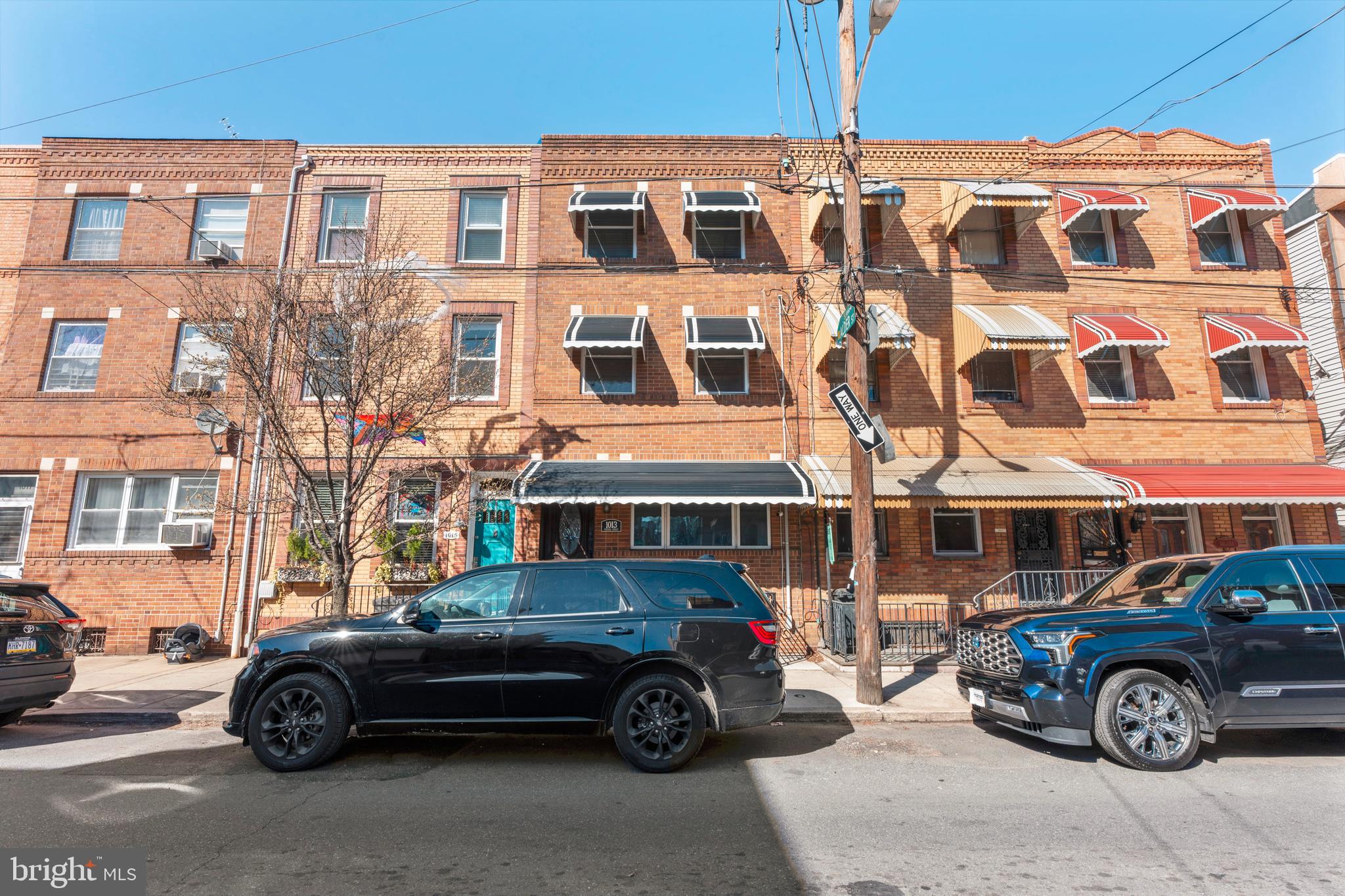 Nestled in the heart of Bella Vista, this beautifully updated three-story row home offers the perfect blend of modern comfort and classic Philadelphia charm. Fully remodeled just three years ago, this home boasts thoughtful upgrades and versatile living spaces, making it ideal for homeowners and investors alike.
Step into the expansive first-floor living area, featuring tile flooring, soaring ceilings, recessed lighting, and a ceiling fan for added comfort. Two coat closets provide ample storage, while the stunning eat-in kitchen is a chef’s dream, complete with stainless steel sink, granite countertops, garbage disposal, and refrigerator. A full ceramic tile bath is conveniently located off the kitchen, along with a rear laundry hookup area that leads to a spacious private cement yard—perfect for outdoor relaxation.
The second floor offers plush carpeting throughout, a primary bedroom with four closets and a ceiling fan, a second bedroom with a closet and ceiling fan, and a beautiful ceramic tile hall bath with a linen closet for extra storage.
On the third floor, you'll find a unique secondary eat-in kitchen with wood floors, a stainless steel sink, garbage disposal, and ceramic tile flooring—perfect for potential multi-functional use. A ceiling fan and an additional full ceramic tile bath complete this level.
The large finished basement provides even more flexible living space, featuring two closets, recessed lighting, ceramic tile flooring, and walkout steps to the front of the home.
Enjoy summer evenings in the private enclosed back patio, offering a peaceful retreat in the city. Additional highlights include a new rooftop A/C unit and modern recessed lighting throughout.
Located in one of Philadelphia’s most sought-after neighborhoods, this home is just steps from vibrant dining, shopping, parks, and public transportation. With its prime location, stylish updates, and incredible space, this Bella Vista gem won’t last long!