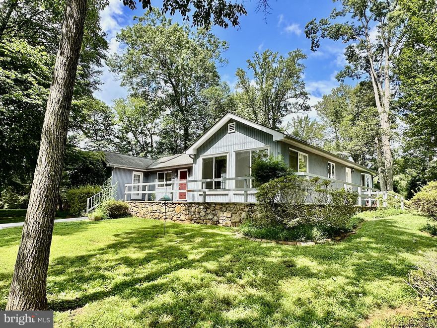 Beaconsfield, a small farm in two parcels consisting of 28 acres. a pond, and a cottage style house tucked away privately in a grove of shade trees.  There are 2 bedrooms, 3 1/2 baths, 20 x 23' great room with beamed ceiling, a stone fireplace, and a wall of beautiful reclaimed, old pine in the form of cabinets and shelves.  A built-in planter and skylights complete the great room.  The two bedrooms have baths ensuite, walk-in  or double closets.  The formal dining room has a cathedral ceiling and built-in china cabinet and large windows.  The eat-in kitchen has the same old pine cabinetry and off the kitchen is  a 15' sunroom with mostly glass bringing in the surrounding countryside.  There is a partial basement, partially finished with a recreation room and potential office with bath.  A 28' deck looks over the landscape.  A large shed serves as storage and garage.  There is a generator.  Sale is contingent on a boundary line adjustment being approved for recording by Fauquier County.  This is in process.  Property is in the Fauquier County land use tax program.   Owner to pay no rollback taxes.  Please do not rely on any assessment and tax information as property has not been reassessed. This country retreat is in 2 parcels - 18 acres and 10 acres - it is doubtful the 10 acre lot is buildable based on soils.  See lister.  Both parcels are subject to a road maintenance agreement, however there is no active committee coordinating the maintenance.  Lot 5 is subject to the Beaconsfield covenants in DOCS.  Verify utilities.  Buyer inspections are welcome.  More land available. "Furnished virtually"