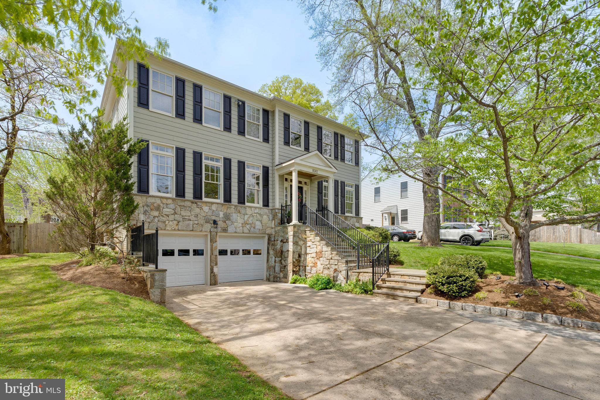 Located in the sought-after Bradmoor neighborhood of Bethesda and within the prestigious Whitman High School cluster, this Craftsman-style home offers outstanding space, layout, and value. Built in 2005, the residence spans approximately 5,500 square feet across three thoughtfully designed levels.
The main floor impresses with high ceilings, gleaming hardwood floors, and a natural flow that enhances everyday living and entertaining. The gracious foyer opens to a formal living room and dining room, while a private home office with custom built-ins offers a quiet retreat. At the heart of the home is a chef’s kitchen with center island and adjoining breakfast space with abundance of natural light, seamlessly connected to a spacious family room with built-ins, gas fireplace and direct access to a two-level deck and patio—perfect for indoor-outdoor living and entertaining. The fully fenced backyard provides privacy and plenty of room to relax or play.
Upstairs, the expansive primary suite features a tray ceiling, dual walk-in closets, and a large spa-inspired bath with double vanities, a built-in Jacuzzi tub, and separate shower. Three additional bedrooms and two more full baths, along with a well-appointed laundry room, complete the upper level.
The finished lower level offers even more versatility with a guest suite and full bath, a generous recreation room ideal for play, fitness, or creative pursuits, and an oversized storage area. The deep two-car garage offers tandem space that could accommodate up to four smaller vehicles. Also, the house has a gas-generator.
A rare opportunity to own a spacious, well-maintained home in one of Bethesda’s most convenient and desirable neighborhoods—don’t miss it!