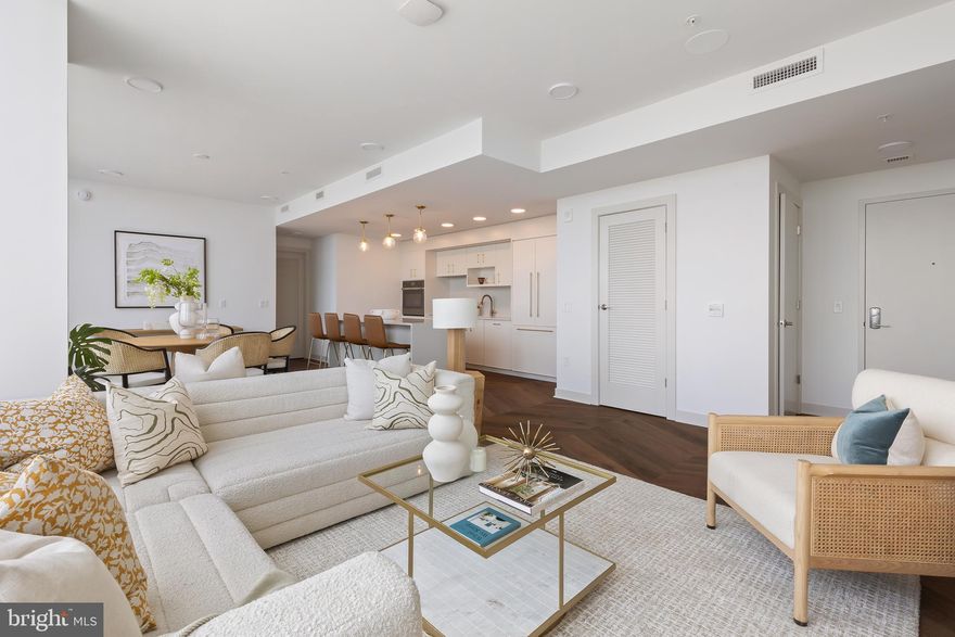 **Luxury Living at Its Finest: The Commodore: Live Life at the Top**
Penthouses are now available for immediate occupancy! Limited Opportunity! Imagine waking up every morning to breathtaking views of DC and VA, surrounded by the finest amenities and finishes. Welcome to The Commodore, where luxury living meets unparalleled convenience. 
 
**Sophisticated Interiors**
Step into your stunning residence, featuring:
* Custom Herringbone flooring 
* White Italian cabinetry that exudes sophistication
* Chef-inspired kitchens with Bosch/Monogram panelized appliances, perfect for culinary masters
* Large kitchen islands that provide ample space for food preparation and entertaining
* Quartz countertops and backsplashes that shine with beauty and durability
* Spa-inspired bathrooms with frameless glass showers 
* Floor-to-ceiling windows that flood your home with natural light
* Motorized shades throughout for effortless control 
* Sonos surround sound system for an immersive entertainment experience
* Elfa closet cabinetry and storage for organized living
 
**Unparalleled Amenities**
The Commodore's amenity spaces are designed to feel like an extension of your home, offering:
* Rooftop terrace with breathtaking views of the city
* Modern waterfall pool for a refreshing escape and soaking up the sun
* Relaxing loggia for outdoor lounging
* Study with outdoor lounge 
* Outdoor lounge seating for al fresco entertaining
* Courtyard with kitchen and fire pits for outdoor gatherings
* Recreational lawn for outdoor activities
* Demonstration kitchen and dining room for culinary exploration
* Indoor clubroom for socializing and relaxation
* Expansive fitness center for staying 
* Create studio for creative expression
* Co-working spaces for remote work and collaboration
* Pet spa for pampering your furry friends
* Package lockers by Luxer for secure package delivery

**Prime Location**
The Commodore is conveniently located in the Rosslyn-Ballston Corridor, with immediate access to local restaurants, shops, and the Courthouse Metro station. Experience the best of urban living, with everything you need just steps away.
 
Don't miss out on this opportunity to live in one of the area's most sought-after luxury residences. Schedule a tour today and discover the ultimate in luxury living at The Commodore.