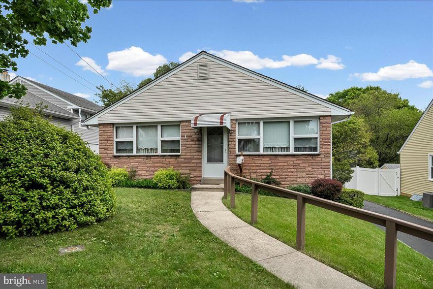 Did you see the square footage on this home?  Over 1800 square feet!  It's on a great street too!  A sturdy brick and siding home with a lovely front yard invites you in.  The large living room has carpeting, ceiling fan and triple Anderson windows.  A formal dining room includes a chandelier along with triple Anderson windows in the front.  The eat in kitchen has oak like cabinets, formica counters, vinyl LVP flooring and an area large enough to house a table and chairs.  From the kitchen you go down a few steps to the enormous family room!  You'll find the laundry room, utility room  and powder room to the left of the stairs and a storage room to the right.  The finished area is perfect for all your family gatherings.  Although the fireplace is non functioning (it's been closed off), there is an electric heater in the wall. Sliders lead to a wonderful level back yard, so perfect for all the family parties!  The high efficiency gas heater was installed in 2010 and the water heater is from 2023. The upper level features a master bedroom with ceiling fan. There are 2 additional bedrooms and a full tile bath with gray tile on the tub walls and vinyl flooring. Did I mention that the private driveway can accommodate at least 5 cars and there's a garage also! While this house has been very loved, it may need a few cosmetics updates and is priced accordingly.  The home is being sold in its as is condition, but what an opportunity!  Come take a look!