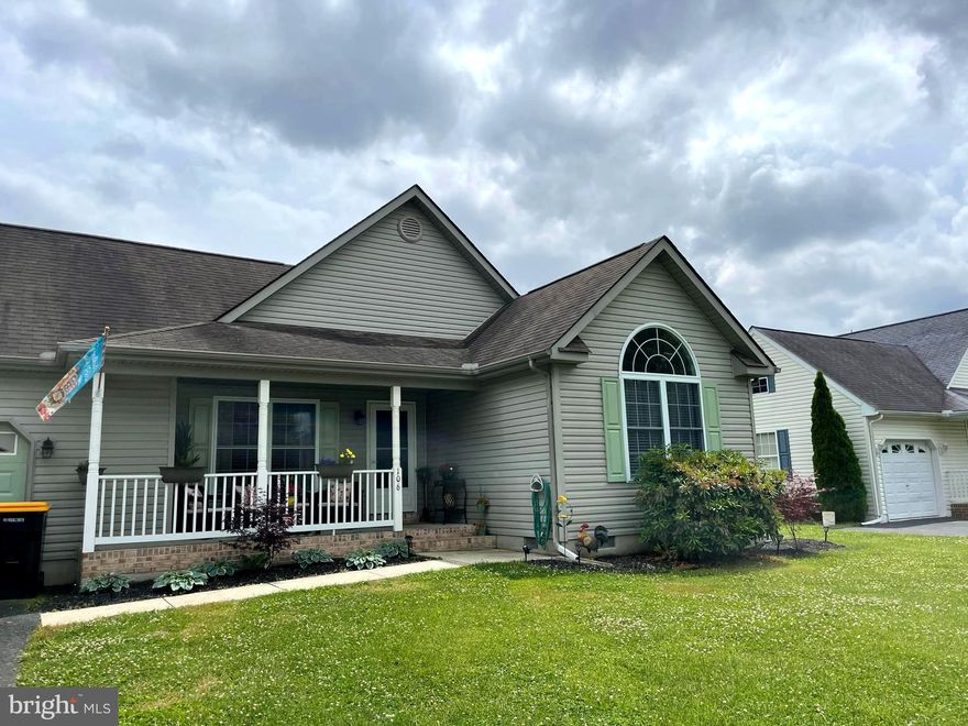 When you think HOME SWEET HOME, you are thinking 106 Boxwood Lane. This home is sweet from inside out. The front porch is inviting with room to relax. As you enter the into the living room, you will notice the high ceilings and open floor plan. Living, dining and kitchen are all tastefully decorated. Luxury vinyl flooring is sleek and easy to keep clean. Lots of light flows in from the sliding door in the dining area that leads to a nice large deck. The kitchen just past the dining area, has new stainless steel appliances. The stove has not one but two ovens. The primary bedroom is large and private with it's own bath. The two guest bedrooms share a hall bath. Attic storage and a one car garage are a plus. Property backs to the walking trail and community park.  This home is sure to please all.