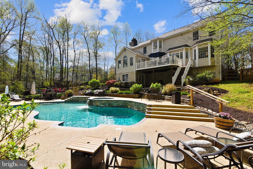 You do not want to miss this spectacular home on 2.56 acres with an inground pool and spa!  Wonderful updated kitchen with granite countertops, stone sided island with gas burners and downdraft.  42" white cabinets, pendant lighting, and stainless appliances!   Newly refinished hardwood floors, all new carpet, freshly painted throughout, new front door, huge, light filled morning room, separate dining room with designer ceilings and bay windows,  formal living room with tray ceiling, study w/ built in shelving & cabinets as well as refinshed hardwood floors. Finished basement has walk out to patio/pool level, lower level bedroom and full bathroom, huge recreation room and ample storage room. Outdoor oasis features trex decking, tons of poolside seating and entertaining space,  thoughtful landscaping, the nature and privacy of more than 2.5 acres and of course, the private pool with waterfall and heated spa!  Inviting upper level looks over the open foyer and palladian window. There are three more generous sized bedrooms, two with walk in closets and an additional full bathroom.  The master retreat has THREE walk in closets, cathedral ceilings, ceiling fan, and a spectacular renovated master bathroom with huge shower, modern soaking tub and gorgeous his and her vanities.  Please check out our interactive floor plan and video!  https://tour.truplace.com/property/793/85680/Please see documents for conveyences and dpor property disclosure to be included in offer.