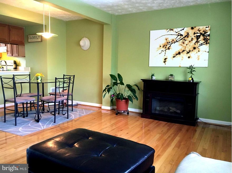 MUST SEE!! Stunning 3-level, 2 BR townhouse featuring beautiful hardwood floors & steps, open-concept kitchen, large-sized bedrooms, updated bathrooms, glass shower doors, wall-to-wall closets, fully finished basement w/ dedicated gorgeous laundry room w/high-end washer & dryer, bonus storage in the attic and basement, large fully decked backyard, 2 reserved parking spaces & more! JUST BEAUTIFUL!